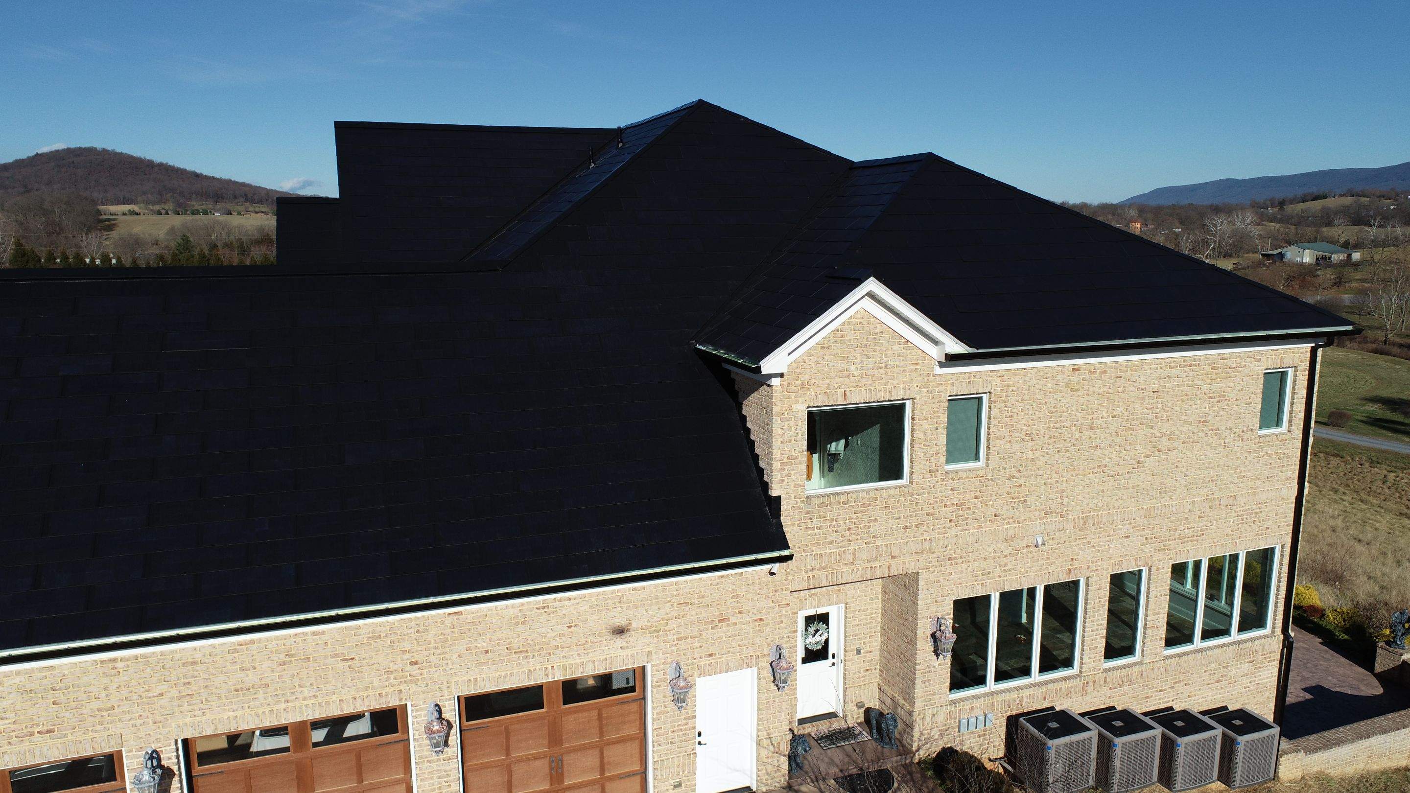 Tesla Solar Roof Replacement  by American Home Contractors
