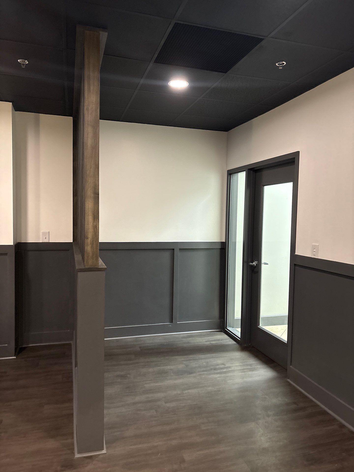 Northlake OLF - Recovery room renovation, flooring installation, front desk, accent wall by Nova HomeWorks 