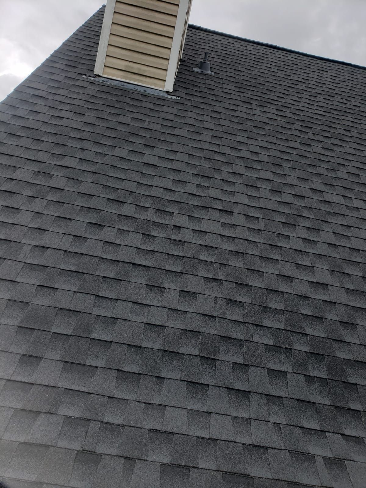 Residential Roofing Installation using Roof Replacement by American Roofing & Construction LLC