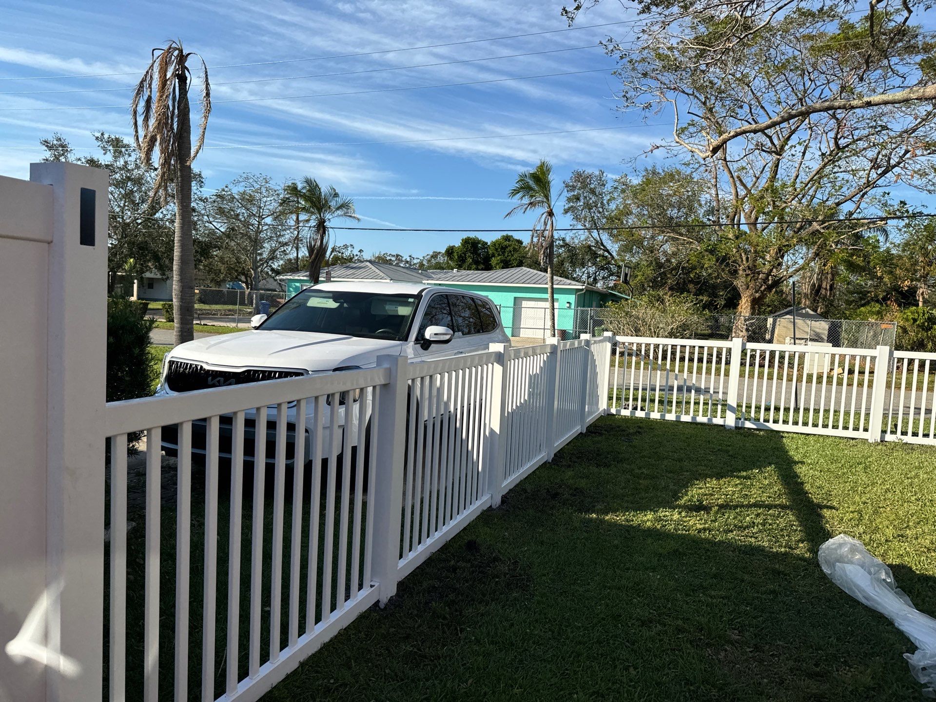 Vinyl Fence Installation using 6Ft White Vinyl Privacy Fence and a 4Ft White Vinyl Picket Fence by Asap fence and gates, LLC