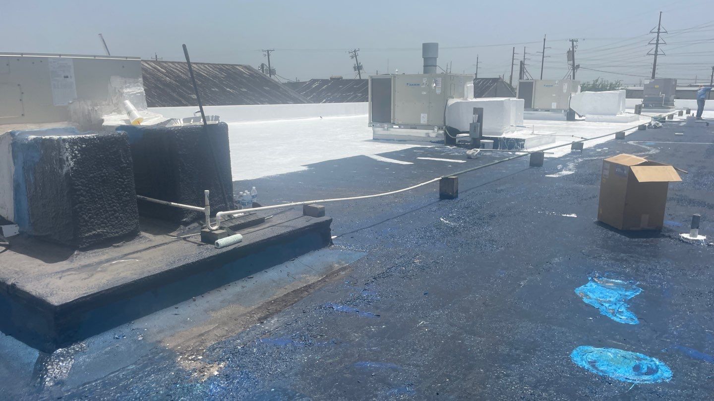 Dirty leaking Gravel Roof by Bayfront Roofing and Construction