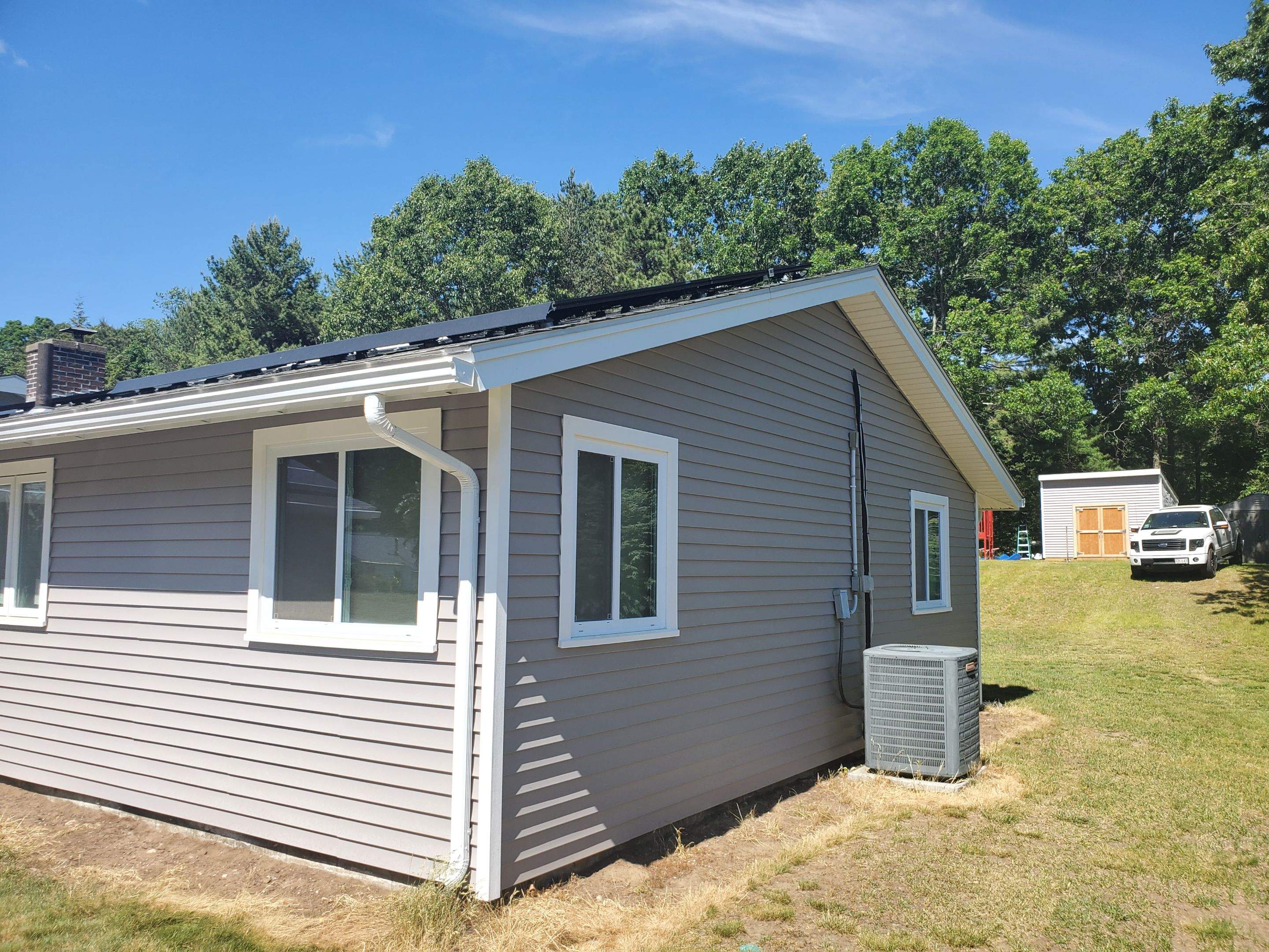 Siding Installation using insulation, PVC trim and vinyl siding by UBrothers Construction