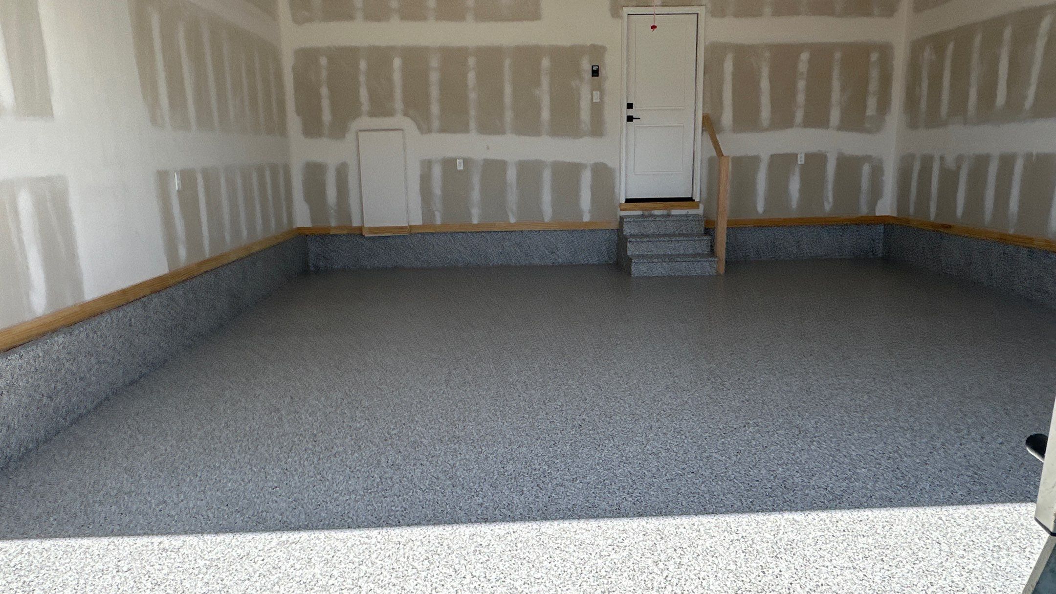 Phil B. new floor with Coyote flake by Banner Garage