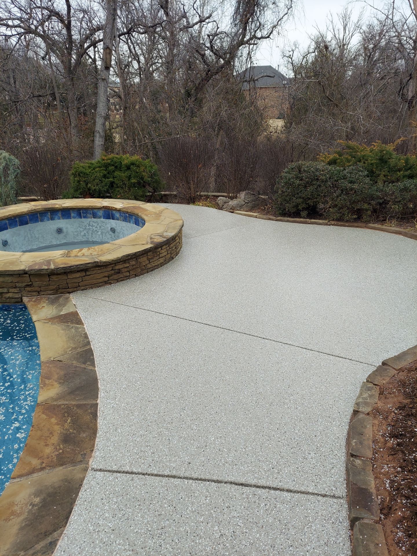 Pool Deck Install with Pebble Beach by Copperhead Coatings