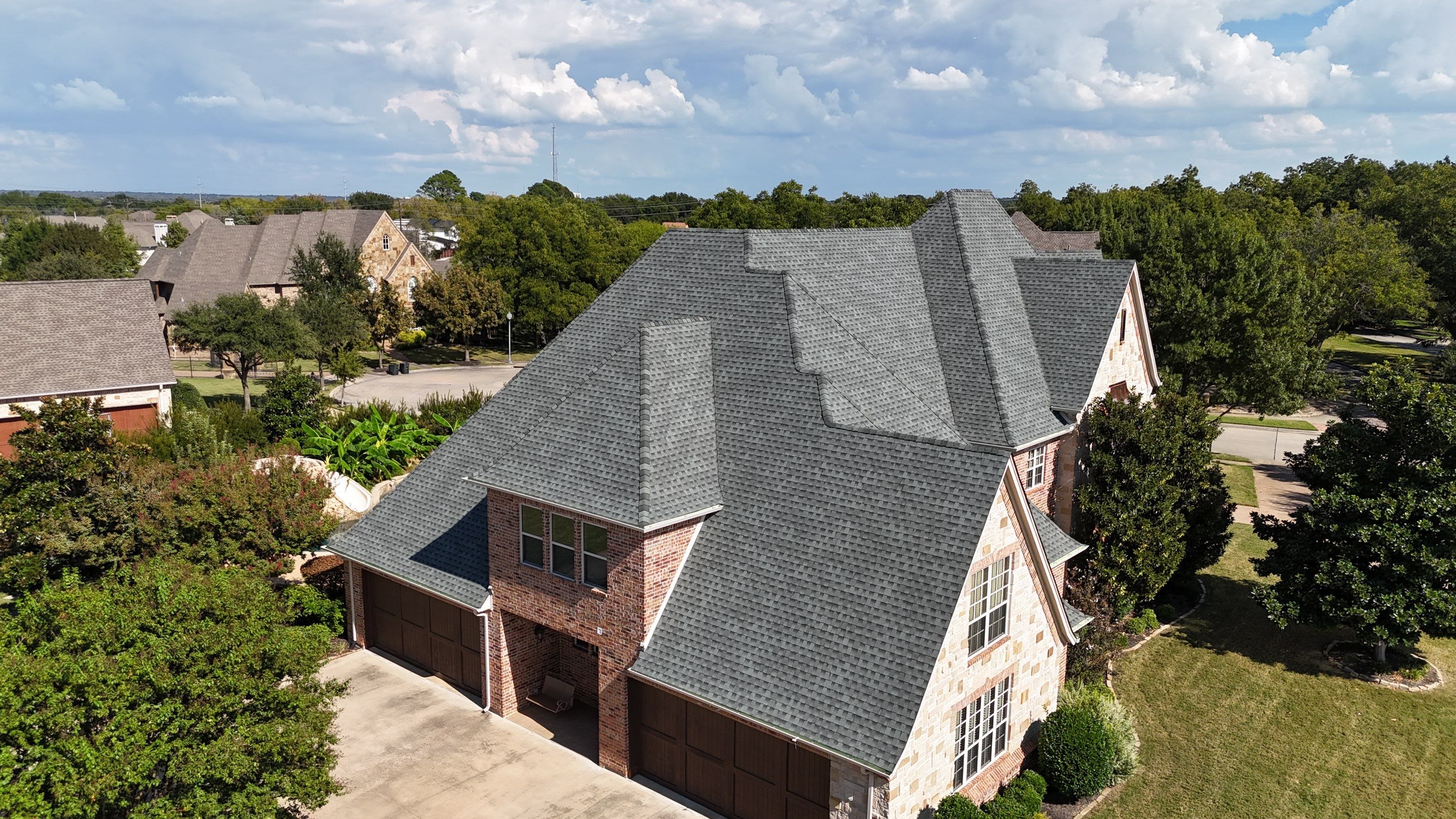 Southlake Texas Estate - Roof, Copper Awning and Gutter Project by First United Roofing & Construction