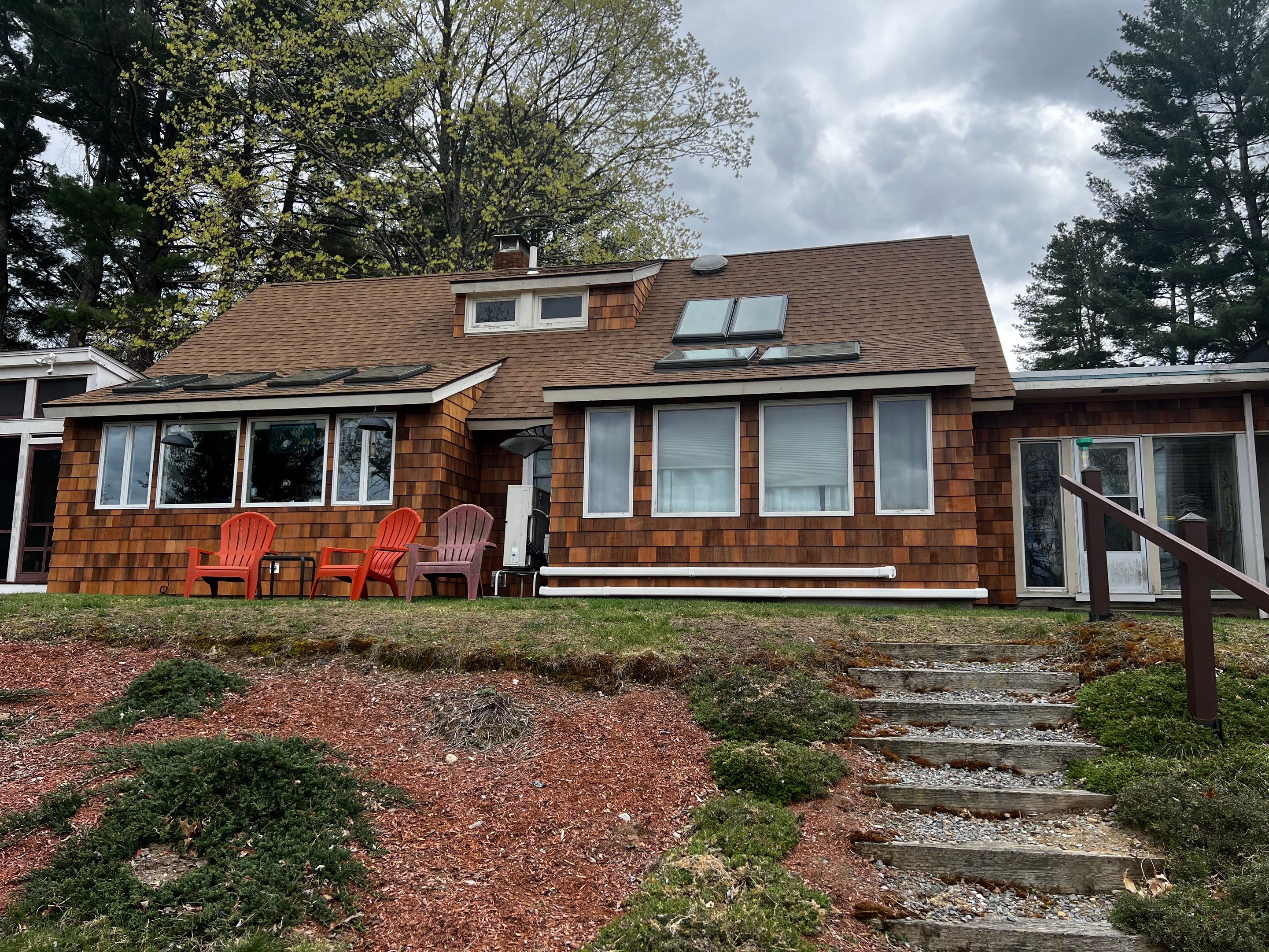 Siding Installation using Perfection Red Western Cedar Shingles  by Loyalty Exterior Solutions 