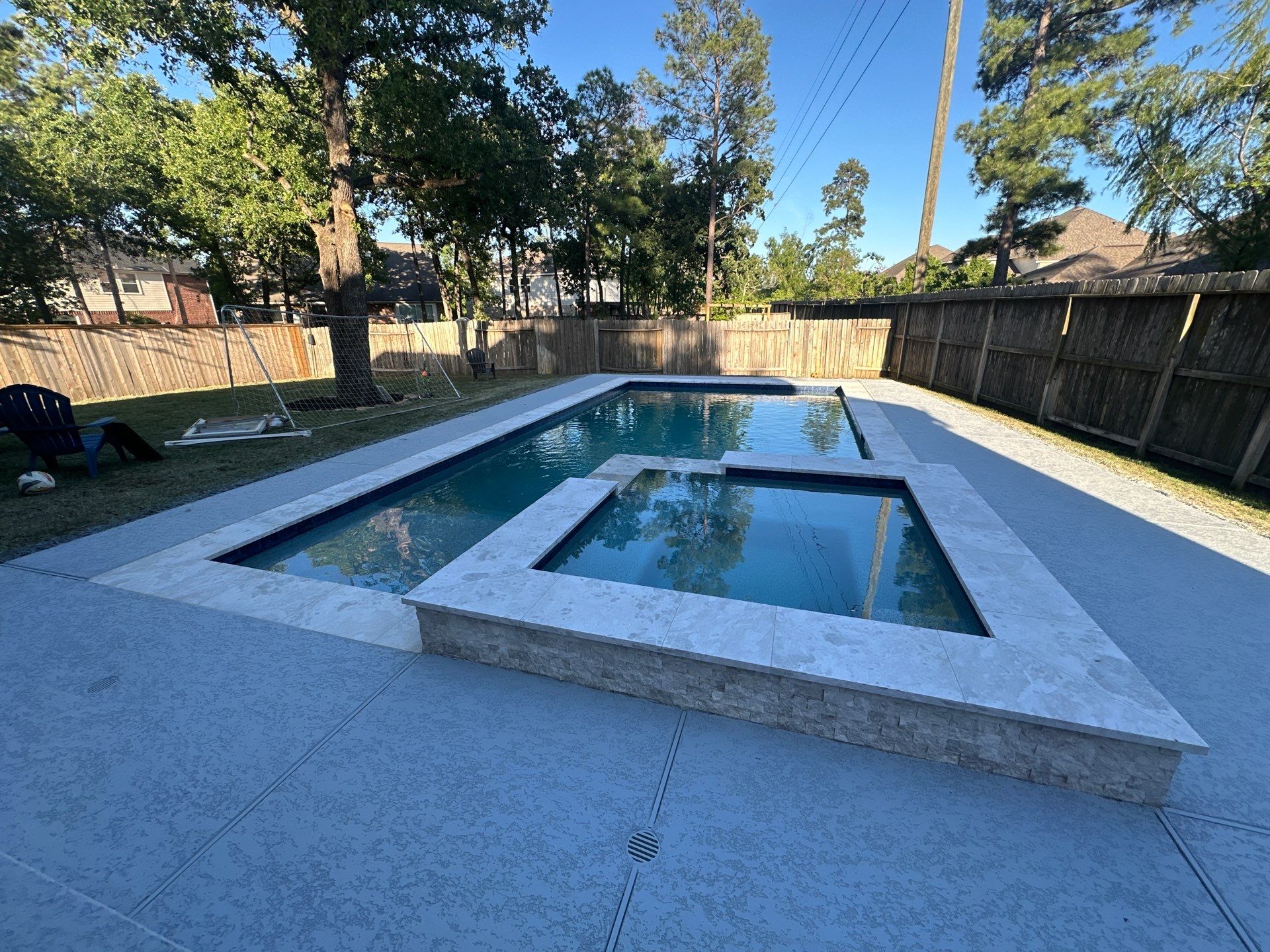 Pool, Patio Cover and Summer Kitchen in Creekside by SophAlx LLC