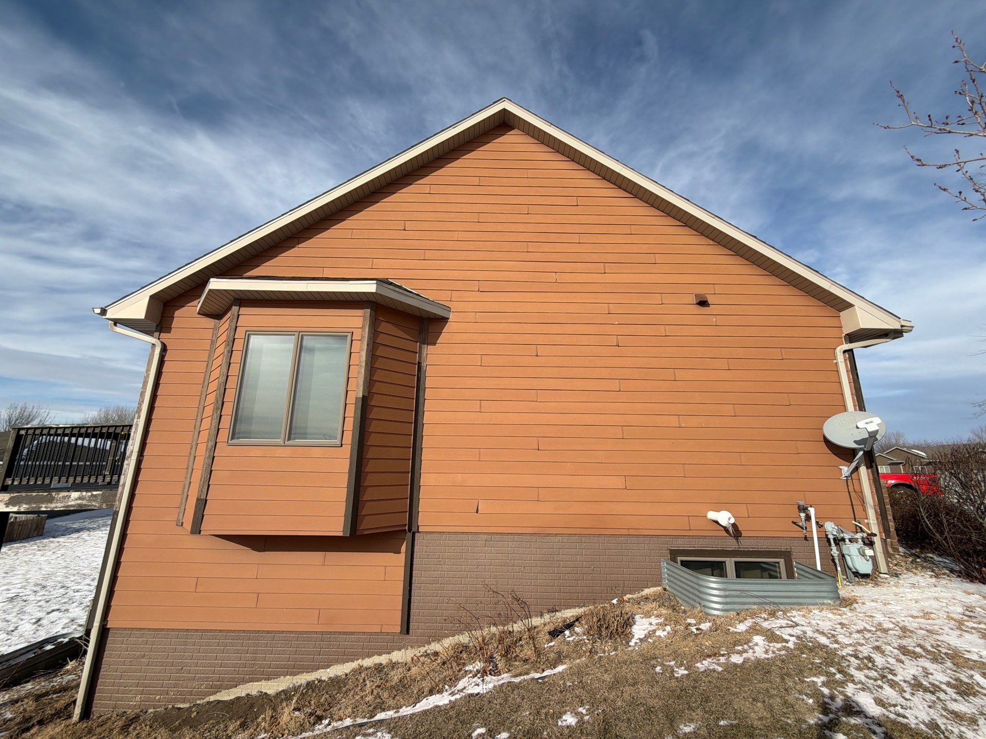 Residential Exterior Painting and Siding Restoration in Crooks by Select Painting, Coatings & Garage Cabinets