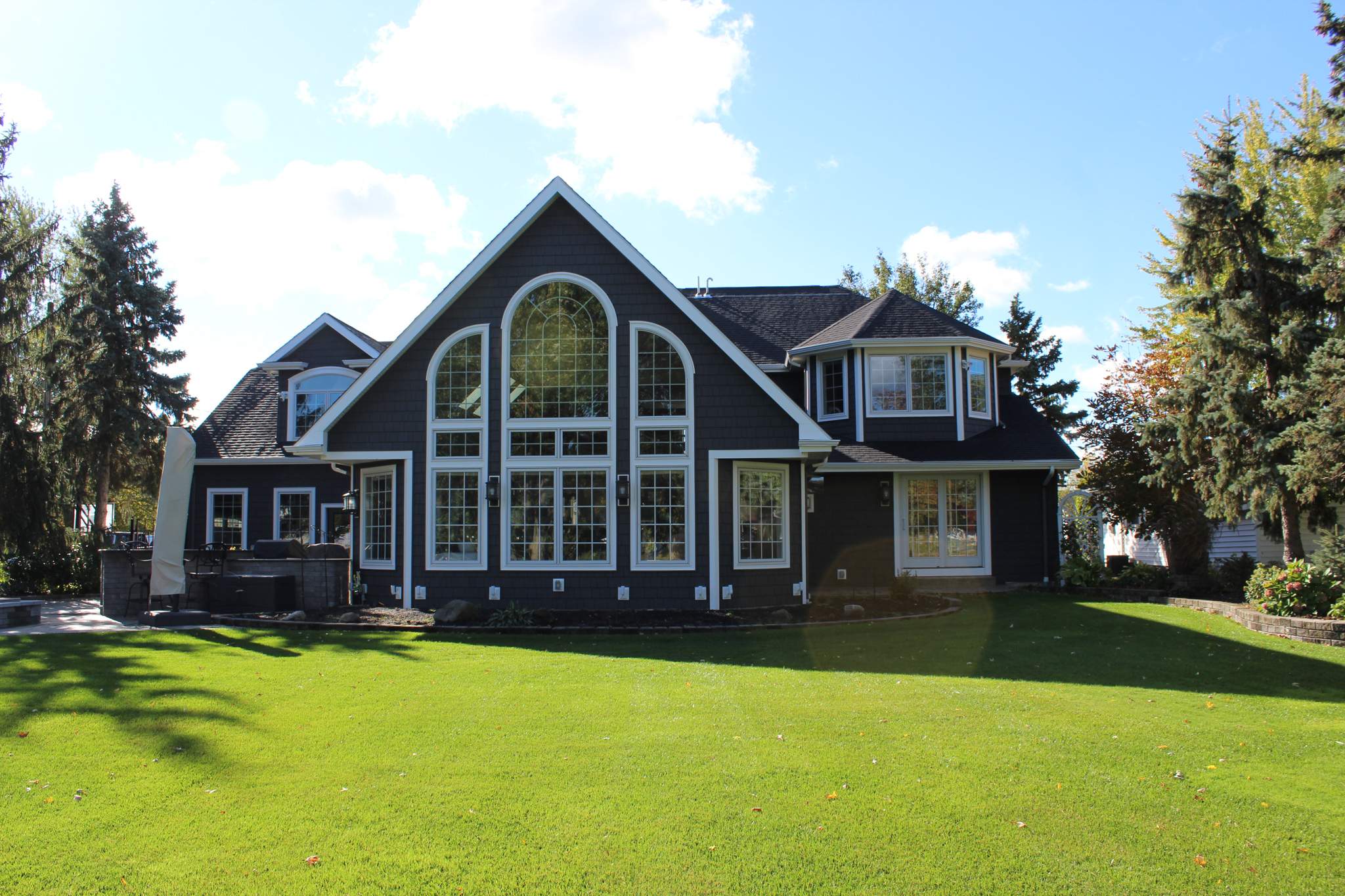 Exterior Renovations- Siding, Concrete, Railings, and Entry Door  by Ivy Lea Construction
