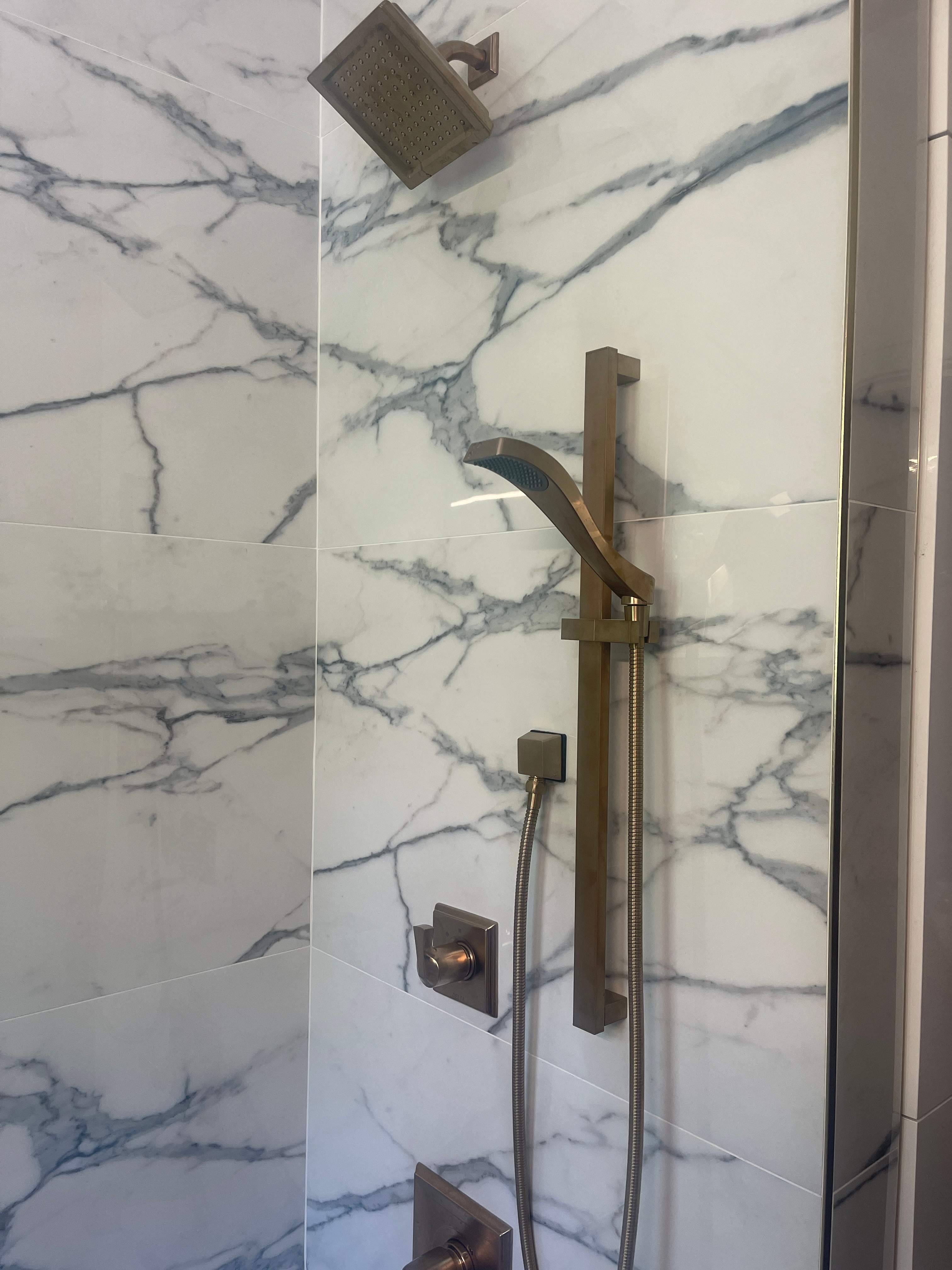 San Antonio Kitchen and Bathroom Remodel Featuring Marble-Patterned Tiles by Mena stone surfaces