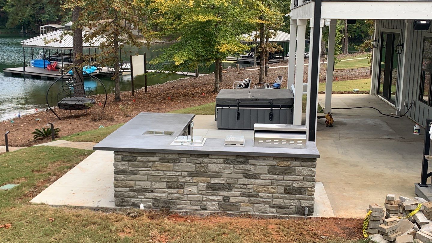 Outdoor Kitchen on Lake Keowee by Xtreme Concrete Services