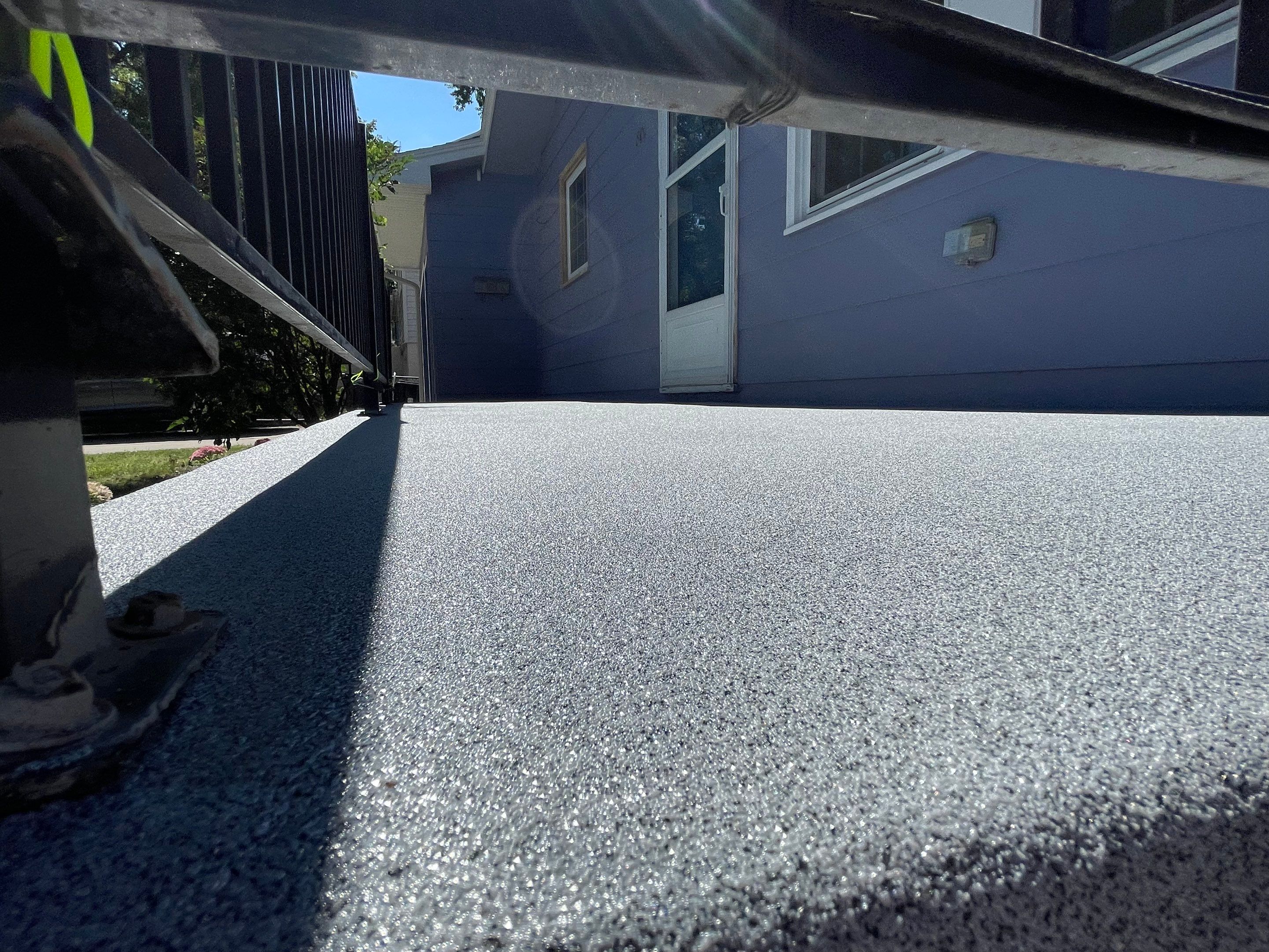 Sioux Falls Concrete Porch Coating with Starry Evening Finish by Select Painting, Coatings & Garage Cabinets