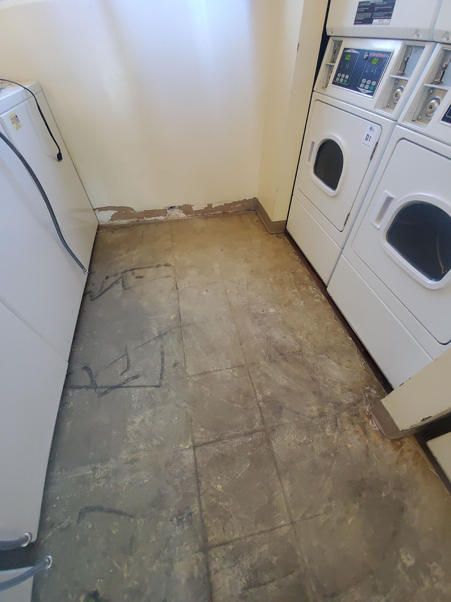 Laundry Room Water Restoration & Rebuild in Irvine by One Stop Source