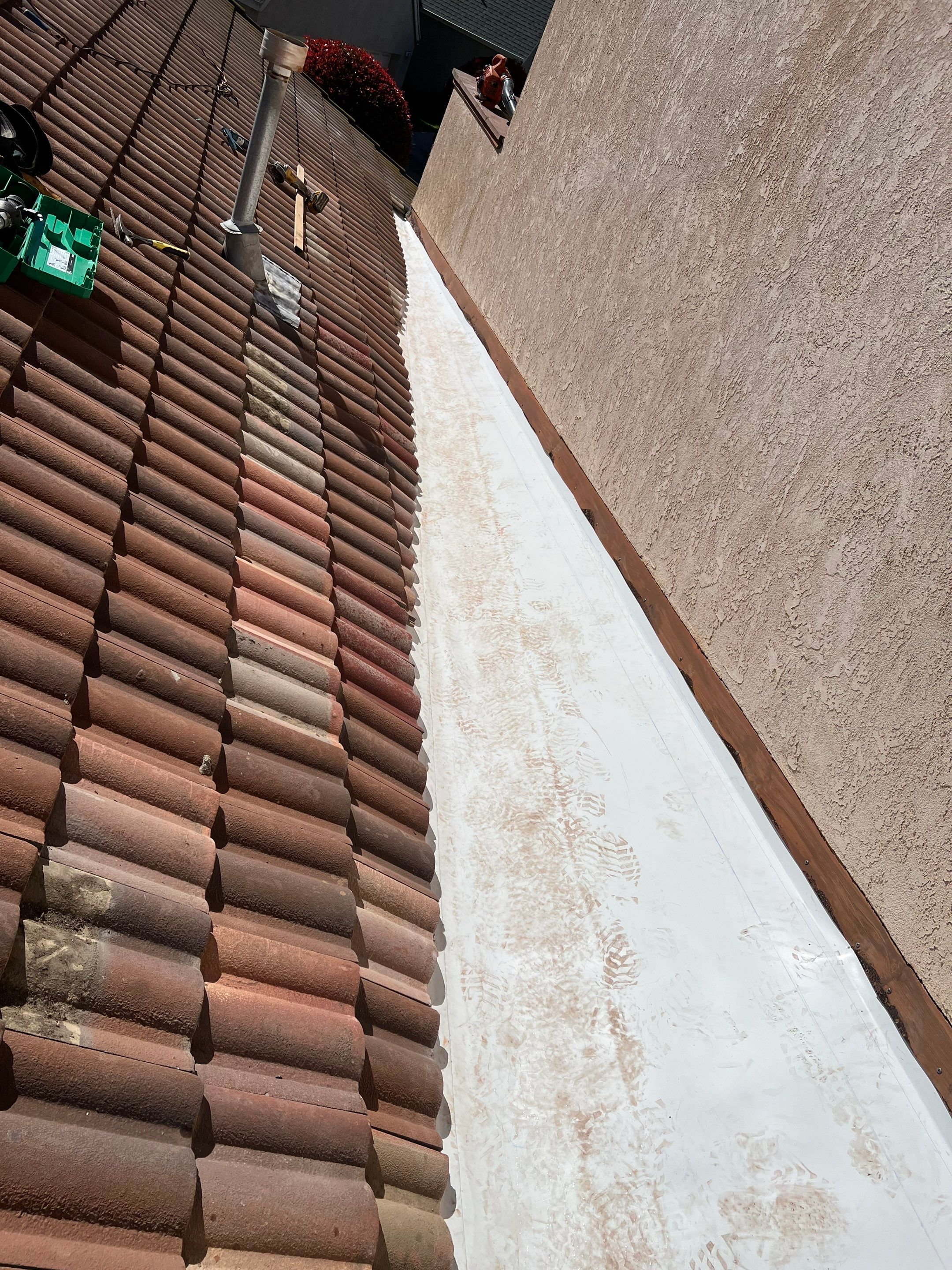 Tile Roof repair by Grandmark Service Company