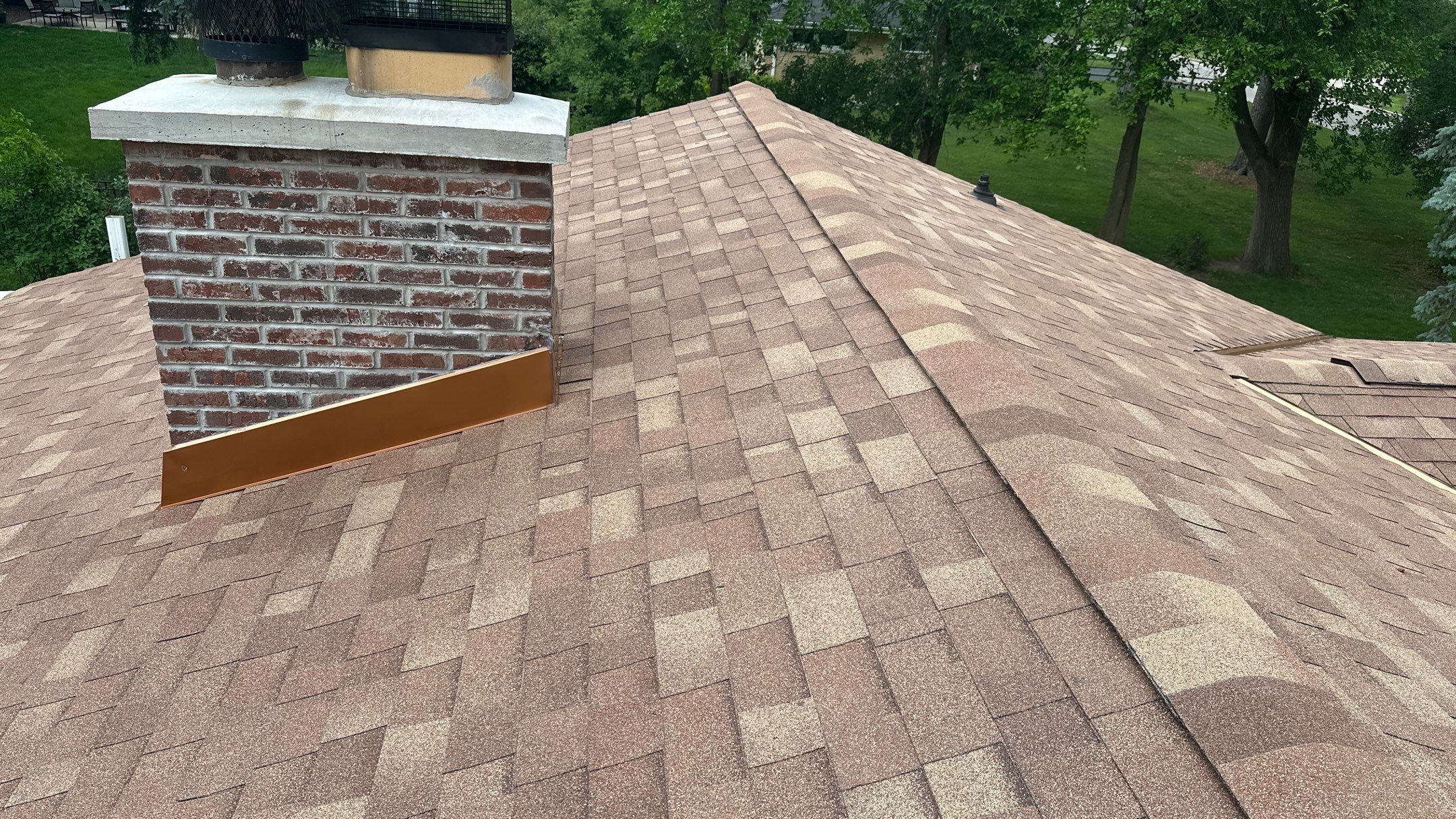 Roof replacement Malarkey Legacy shingles color Sienna Blend by Pro Home Services Inc