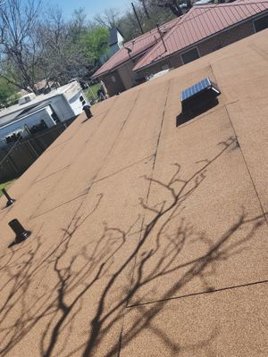 Torch down modified bitumen roof and full fascia "face-lift" in Elgin, TX
