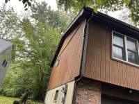 Siding Installation using JH Batten Smooth, CedarMill Plank STMT, and Panel Smooth by ExteriorPros