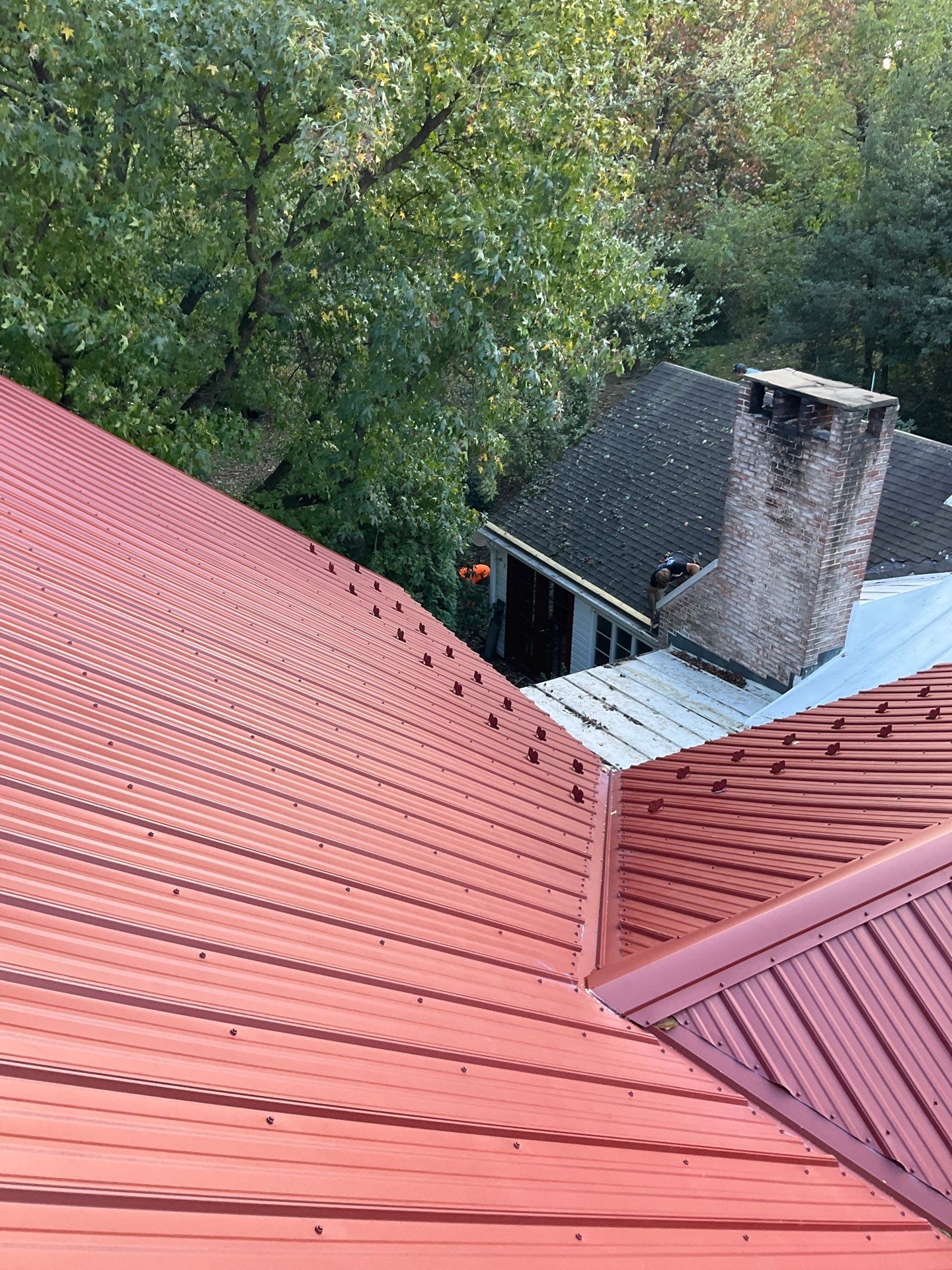 Red Metal Roofing Installation and Trim Restoration in Bernville by Esh Builders