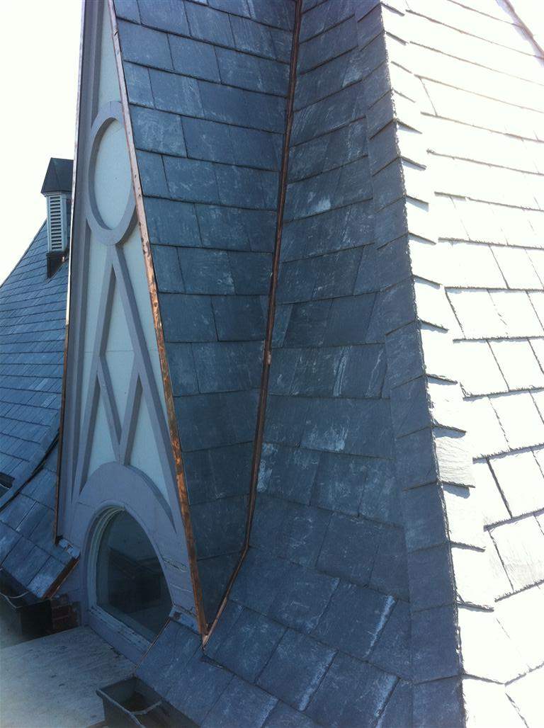 Historic Building ROOF REPLACEMNT with GAF TruSlate  on steep slop and Versico 60mil TPO on flat roof by Gorilla Exteriors Contracting, LLC
