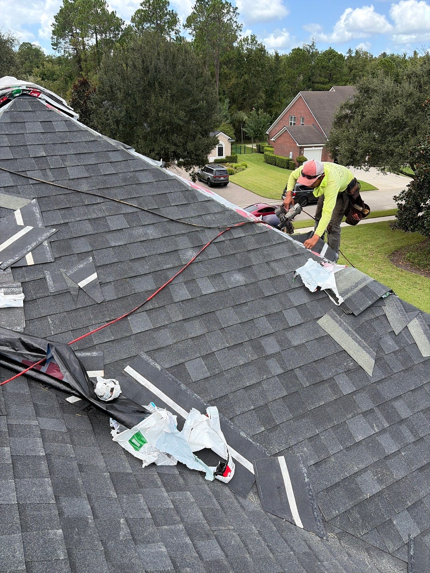 Architectural Shingle Roof Replacement and Skylight Integration in Jacksonville by Miller Roofing Solutions LLC.
