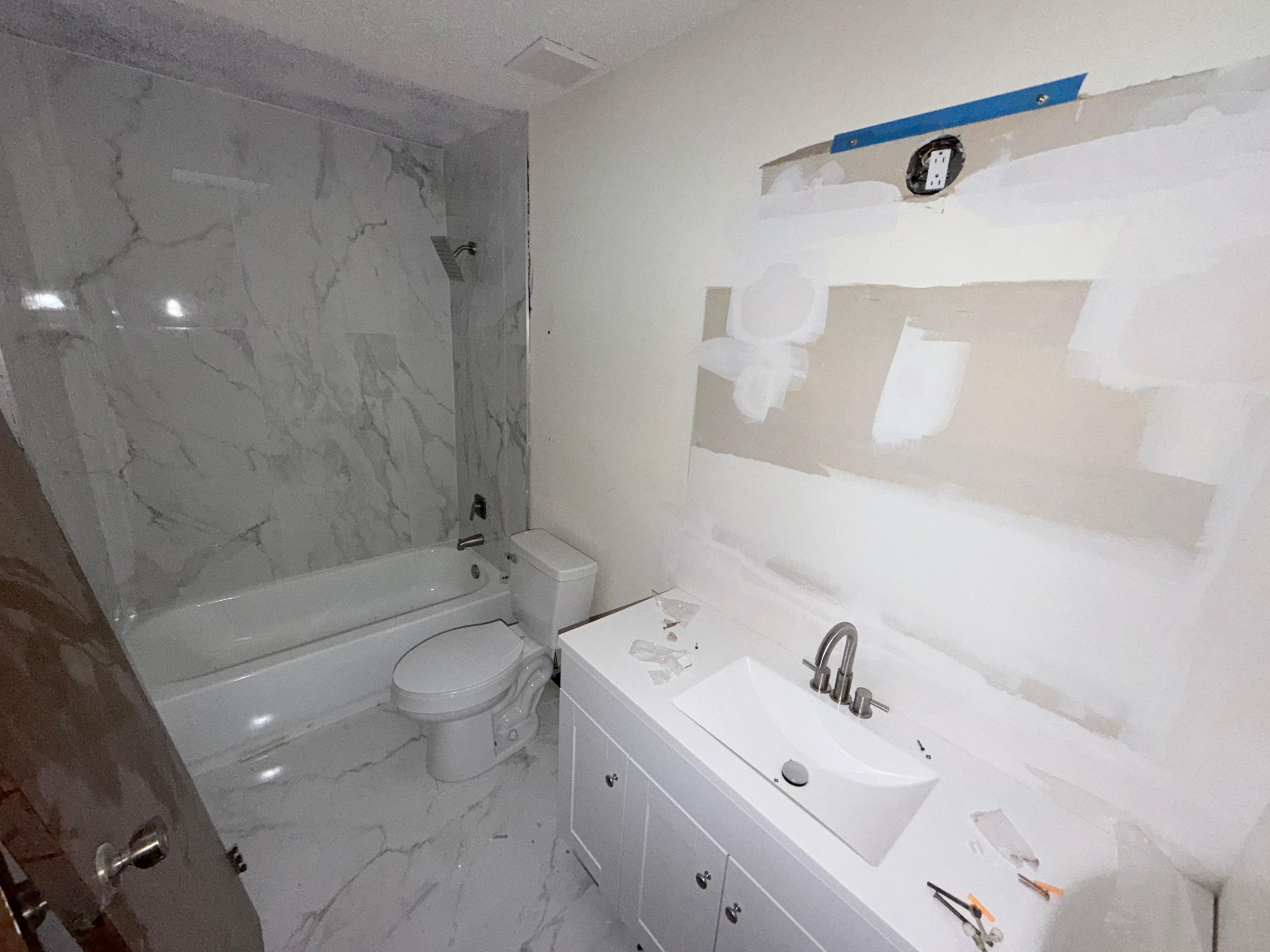 Full Home Flooring & 2-Bathroom Renovation by urban green energy llc