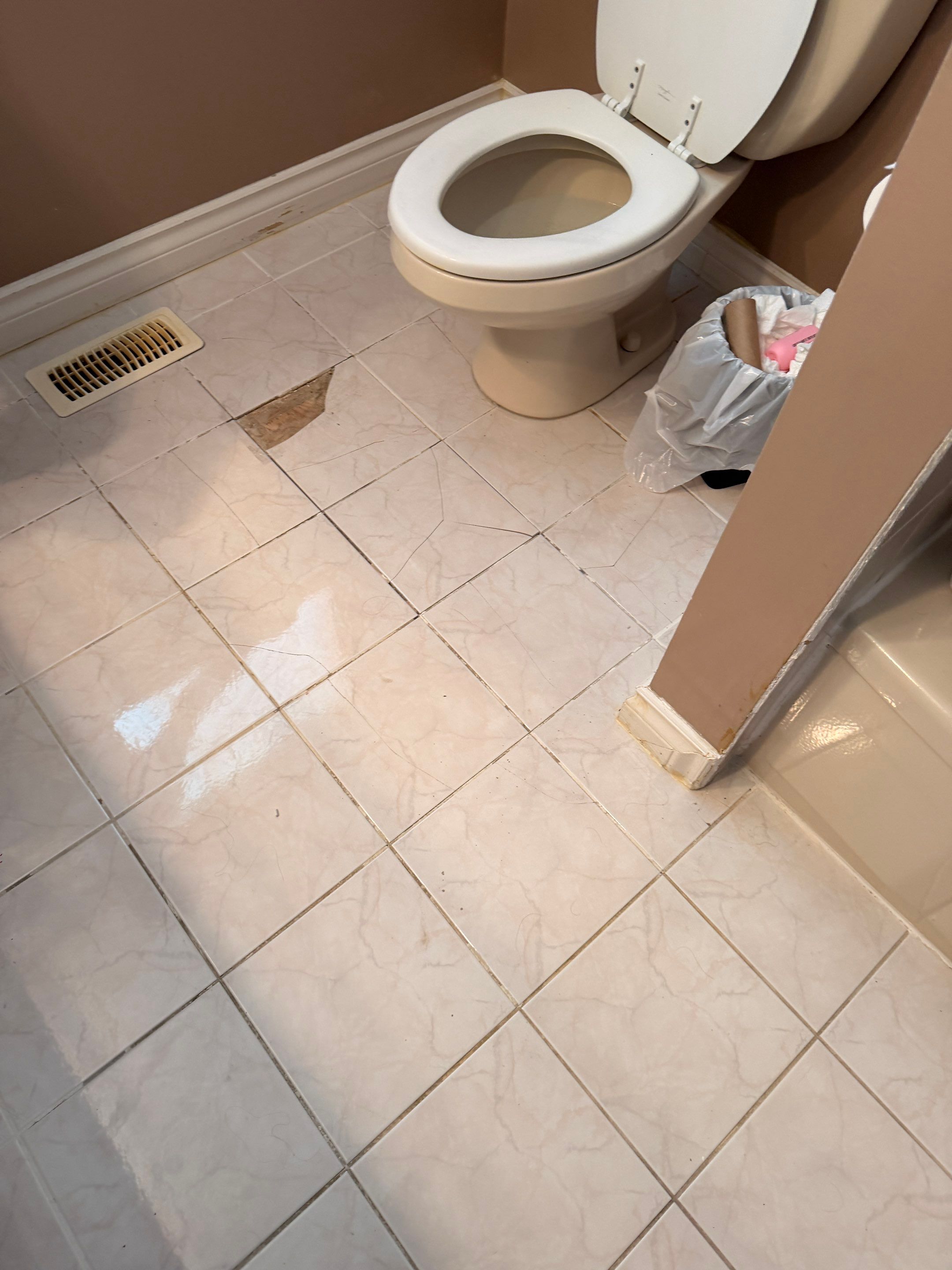 Bathroom Tile Floor Upgrade After Toilet Leak – West Vancouver Rental Property by YVR Construction Group