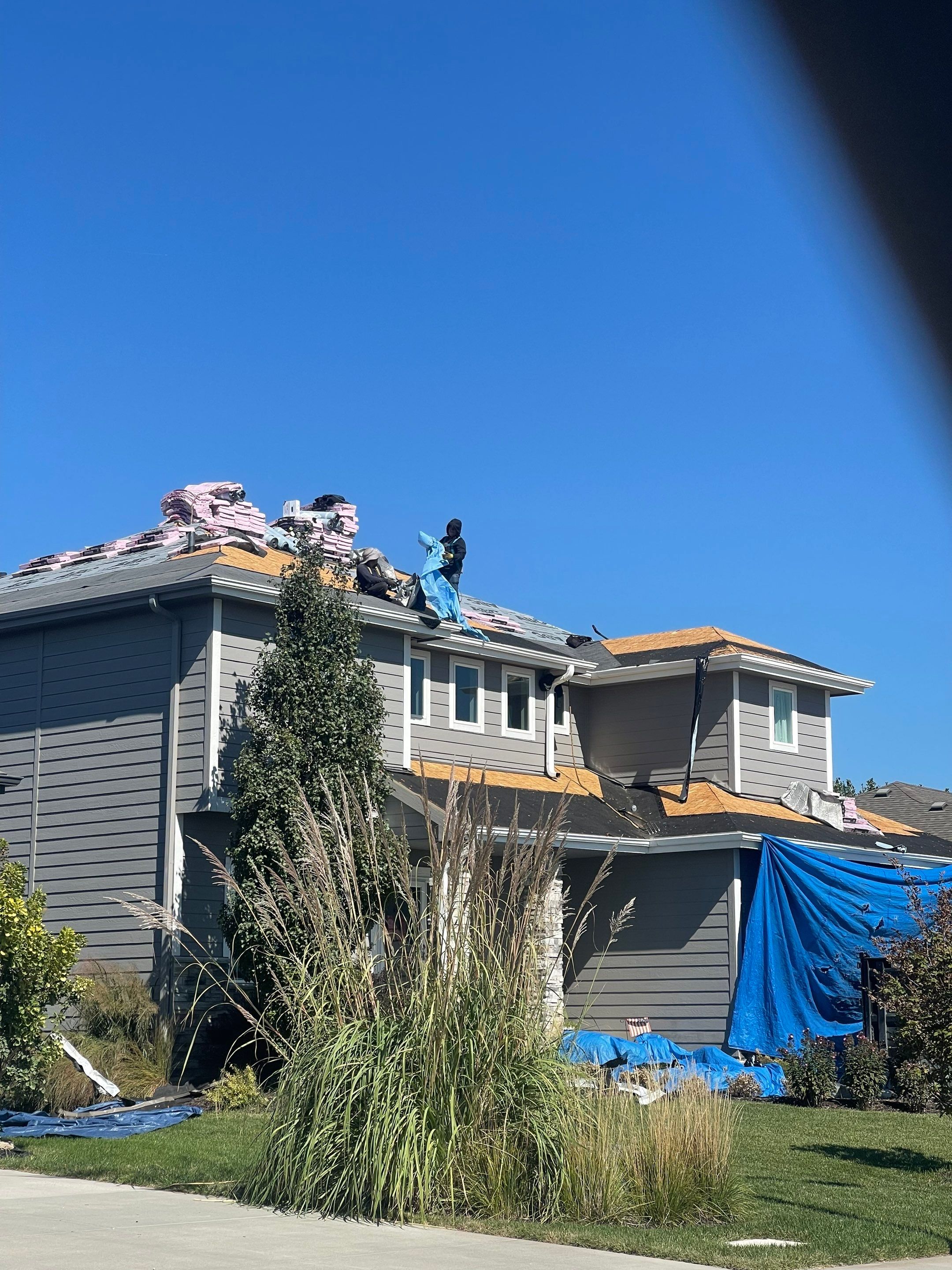 Residential Roofing Installation using Asphalt Shingles by Lightning Exteriors