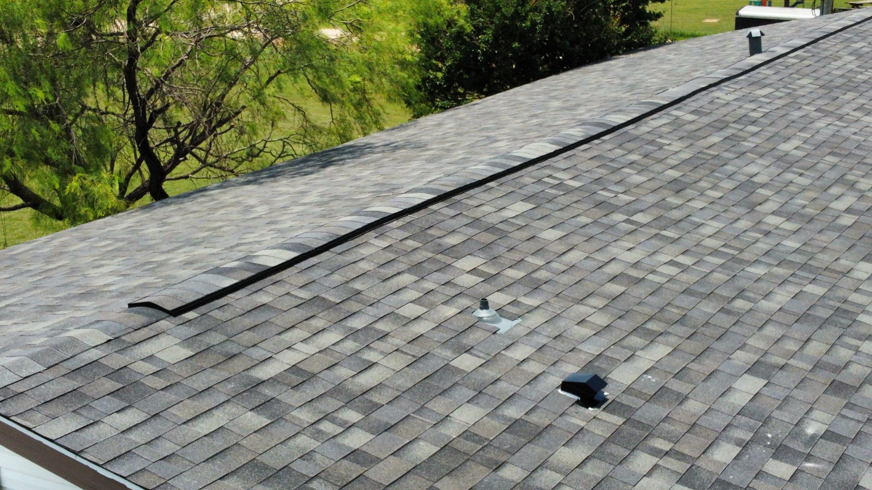 Residential Roofing Installation using ATLAS Pinnacle Pristine Shingles by Harvey Roofing & Construction