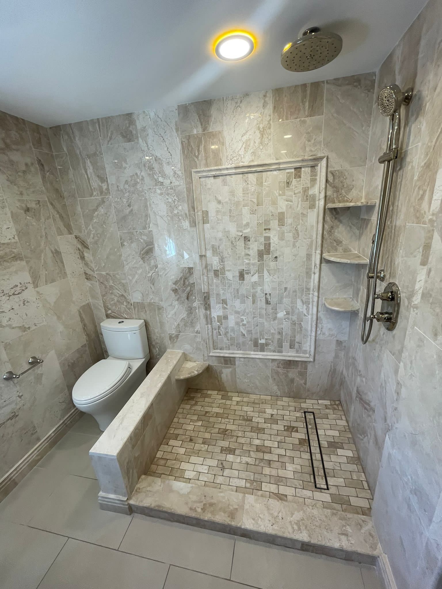 Bathroom Remodel using Tile by Home Concepts Construction