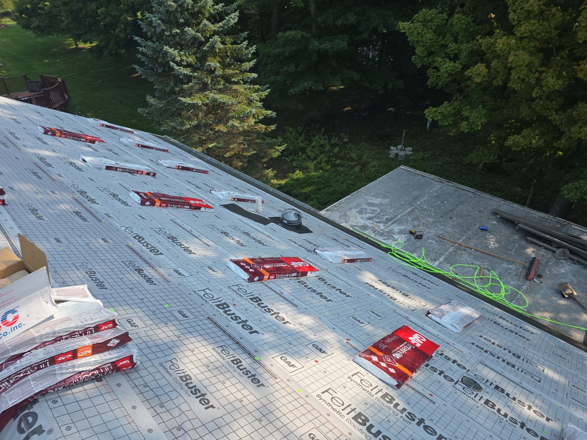 Residential Roof Installation in Sheboygan Falls, WI: GAF Timberline Natural Shadow Shingles & Rain Drop Gutter Protection by Gellings Roofing & Siding