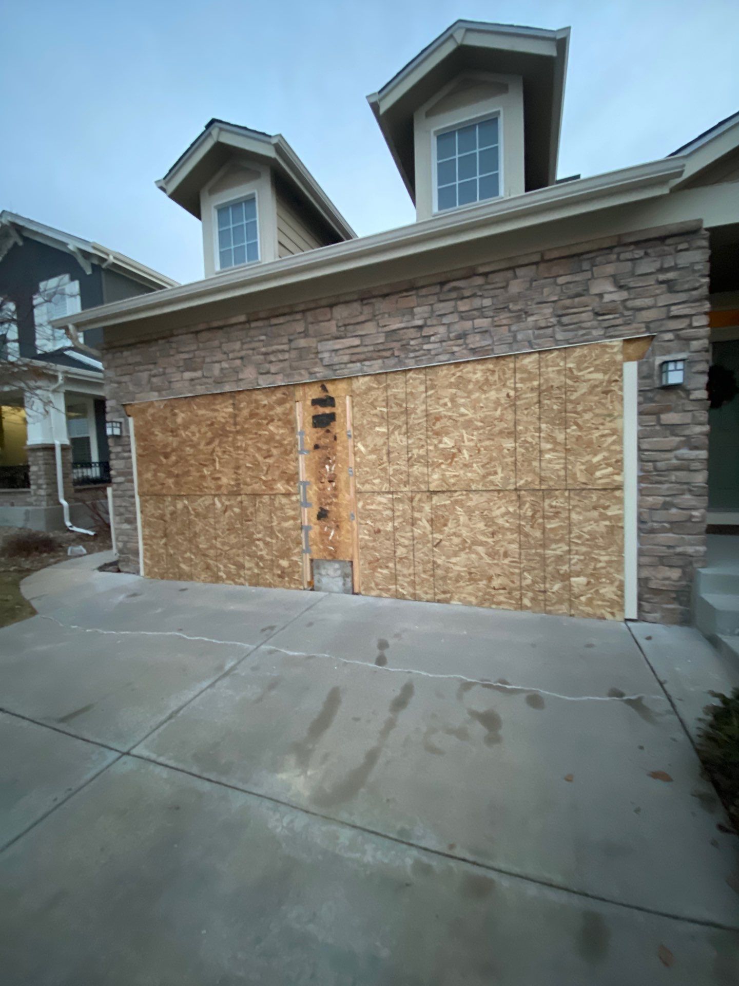 Garage door conversion by David & Goliath Contracting 