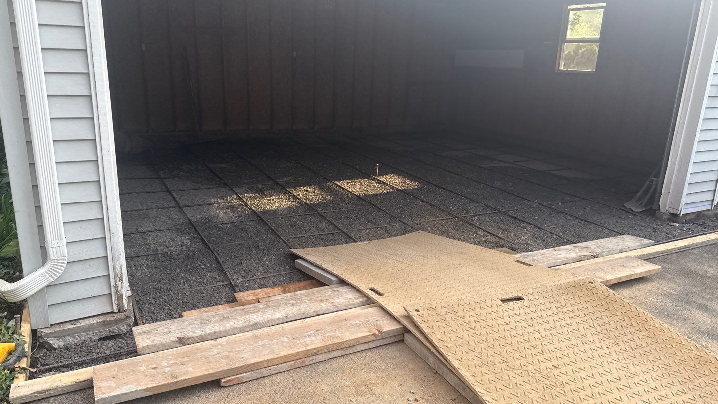 Concrete garage floor replacement  by NG Masonry & Construction LLC