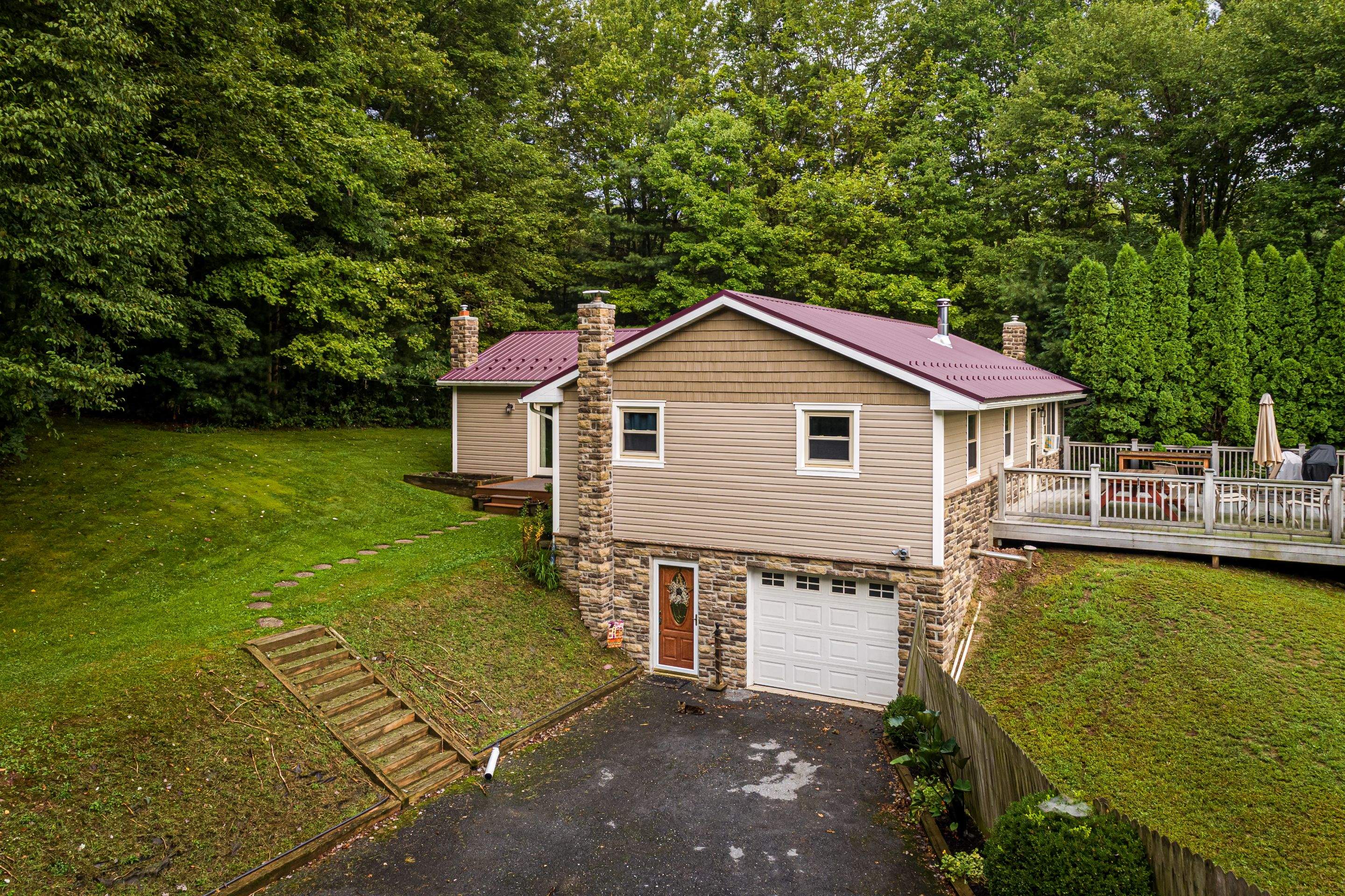 Vinyl Siding- by Esh Builders