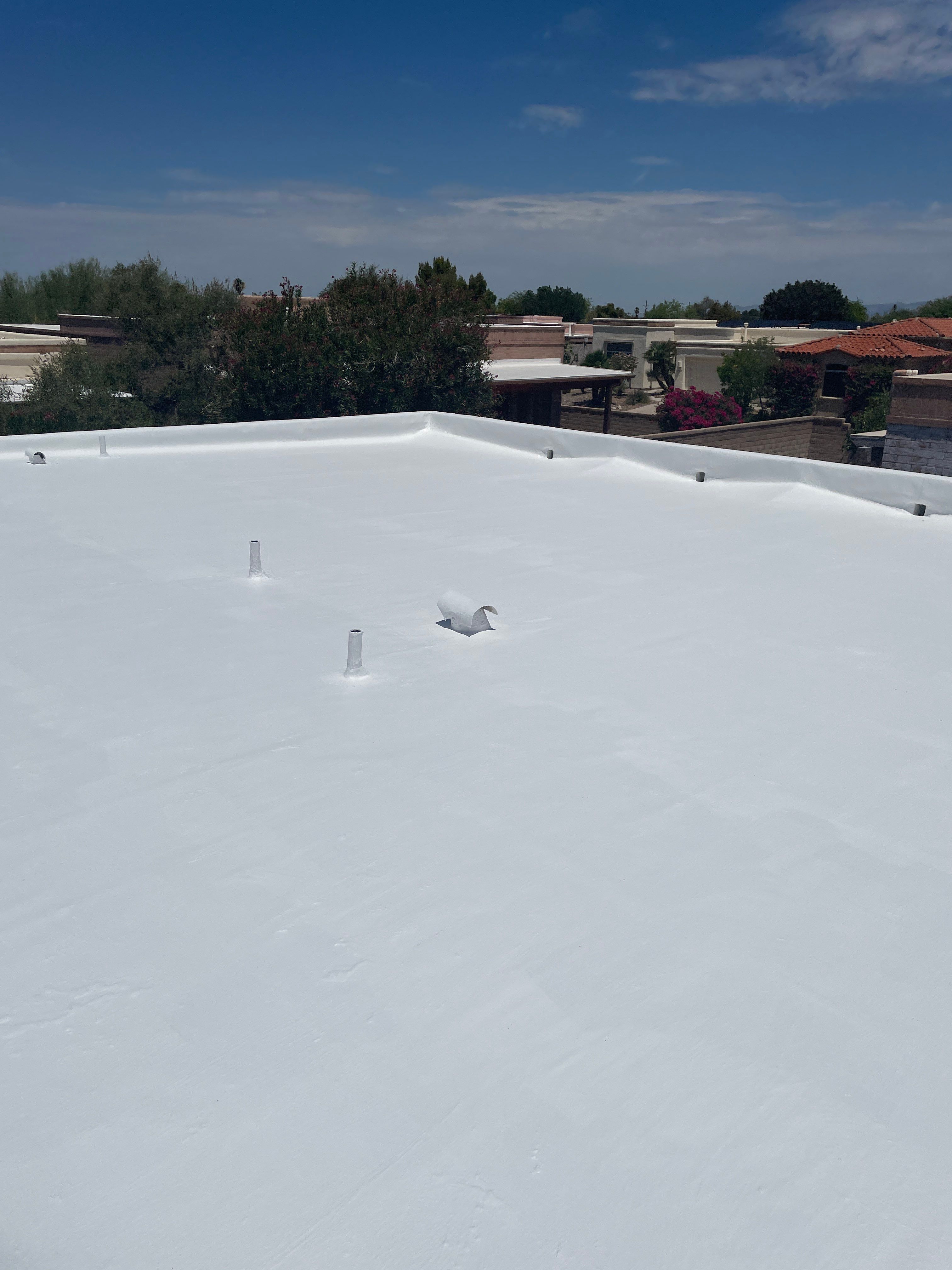 Tucson Residential Roof Restoration with Tile and Elastomeric Coating by West Coast Roofing AZ