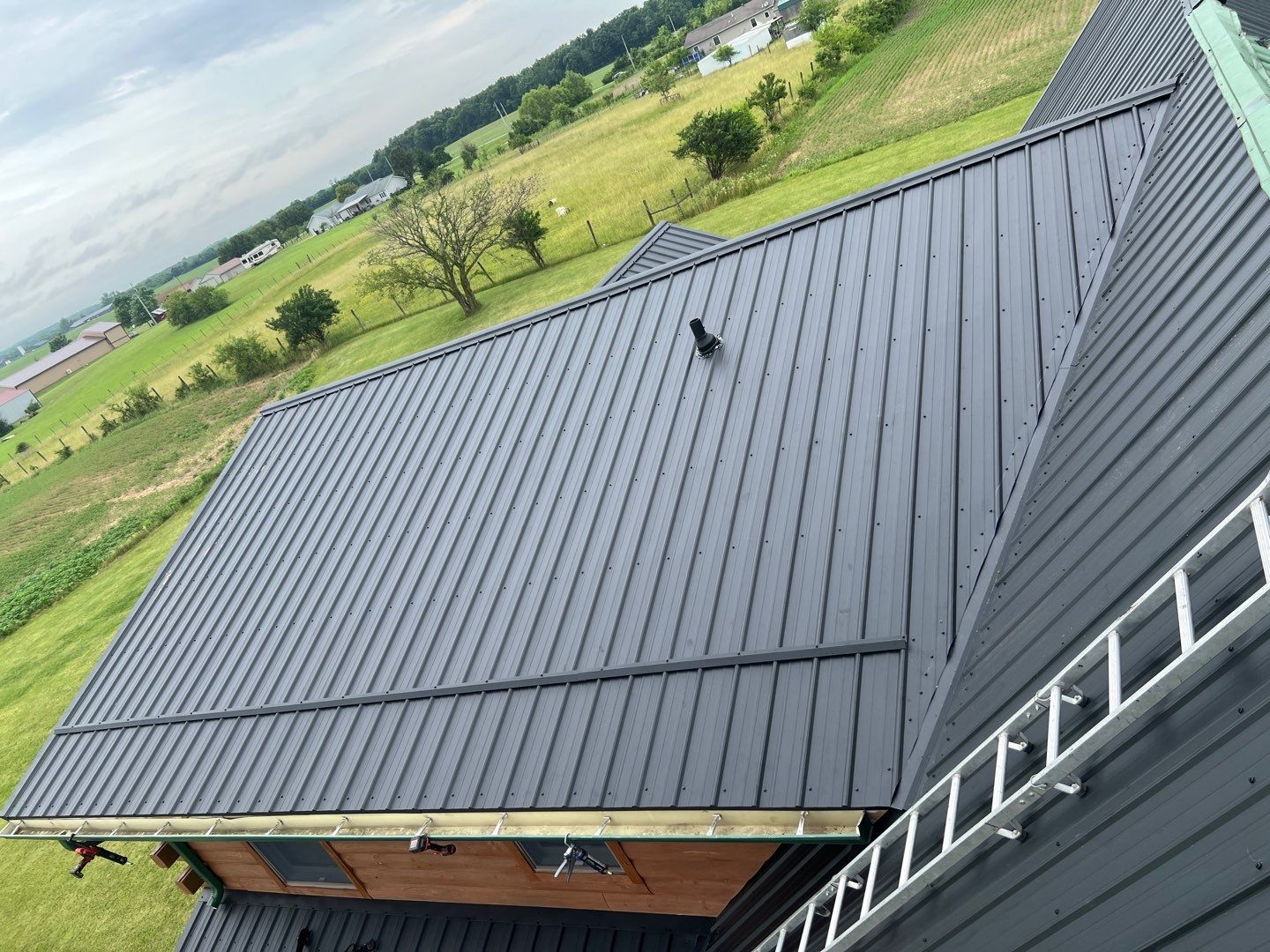 Residential Roofing Installation using Performance Panel Metal - Frost Black by RoofX 