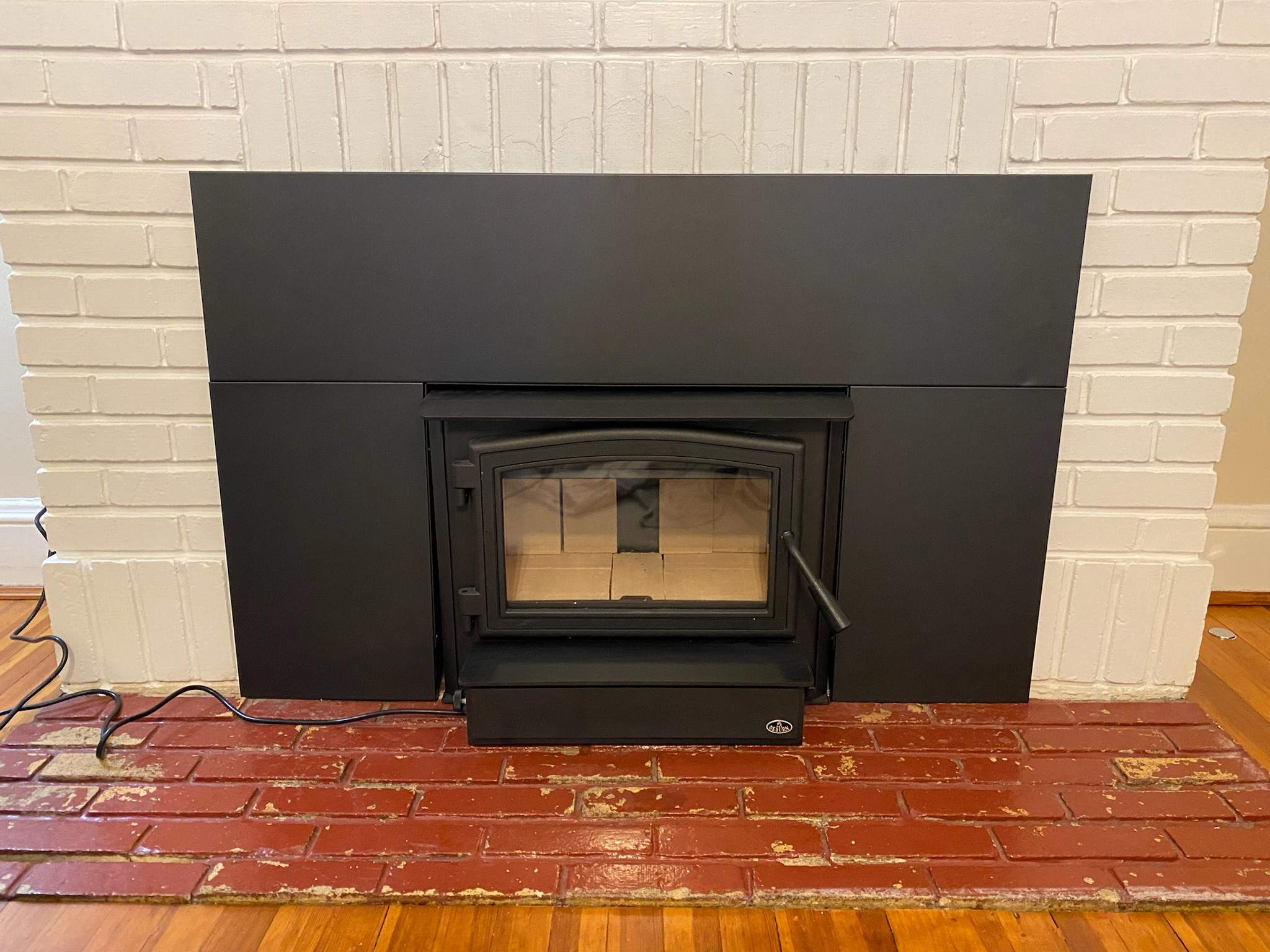 Wood Stove Insert in Norfolk, VA by Premier Chimney and Roofing