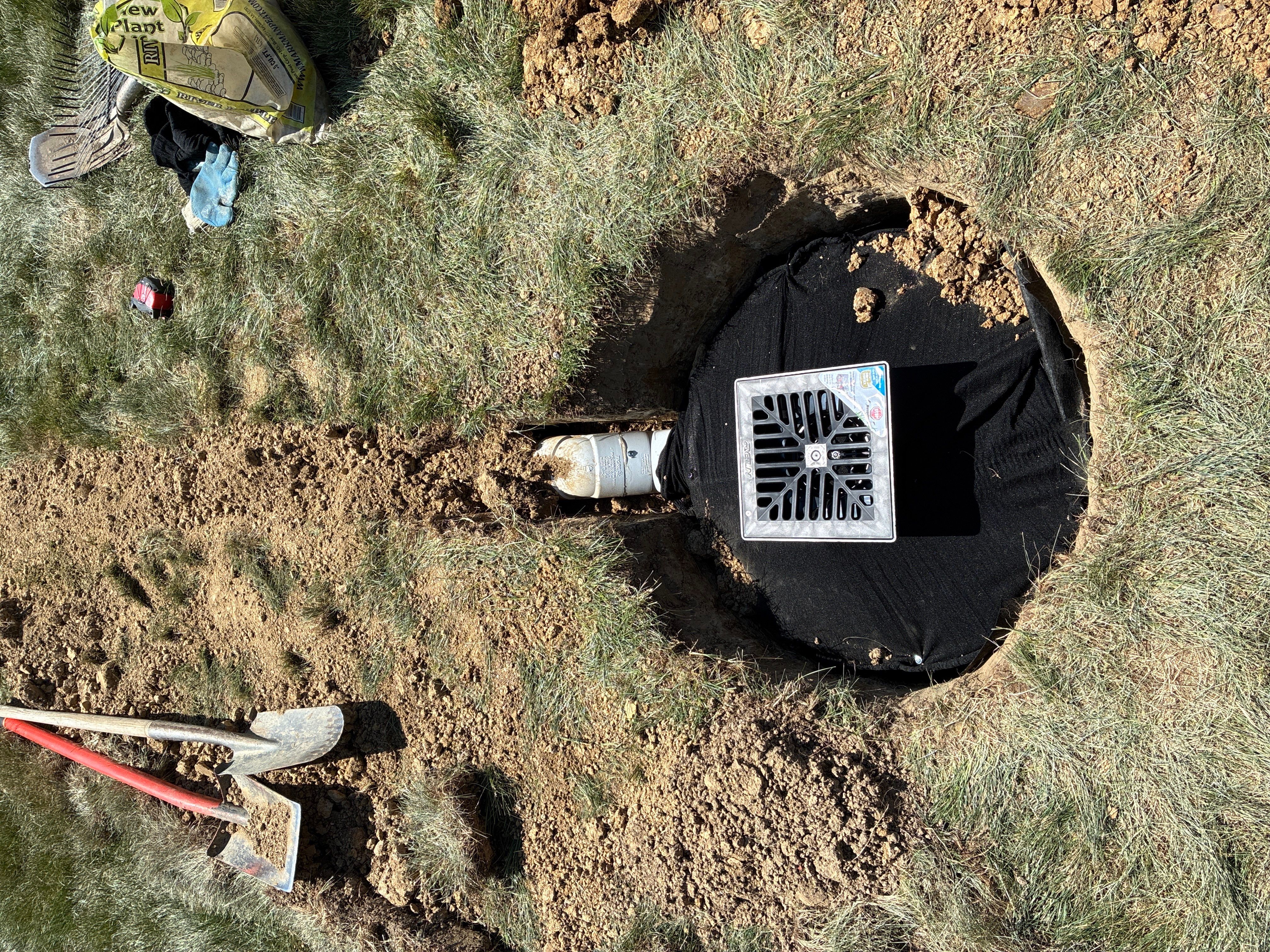 Buried Downspout Extensions  by Homeward Environmental LLC