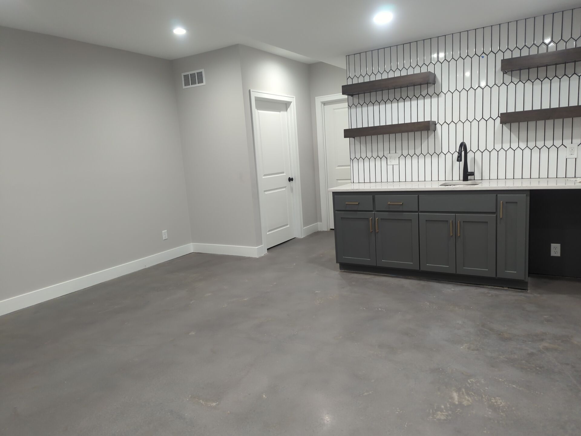 Lee's Summit -- Polished Concrete with Grey Dye by Big Red Decorative Concrete, LLC