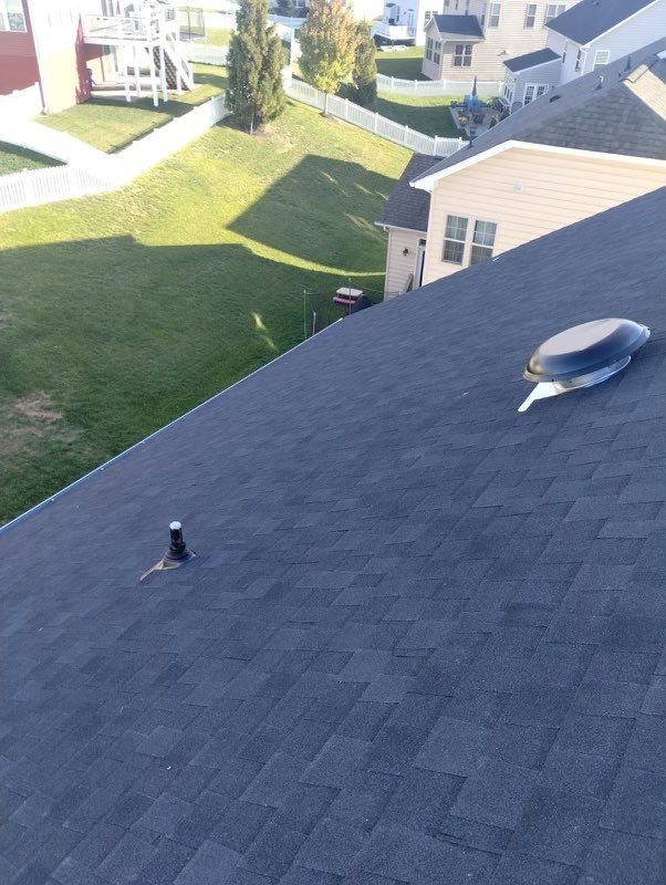 Residential Roofing Installation using Atlas Pinnacle Pristine Black Architectural Shingles by Frederick Roof Repair