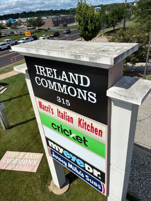 Monument Sign Maintenance and Storefront Graphic Updates for Ireland Commons