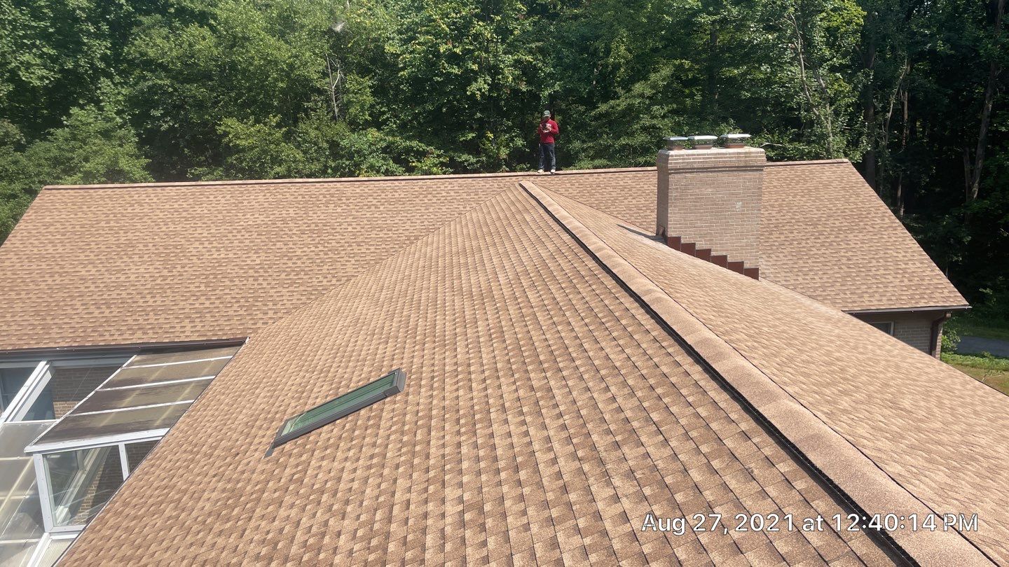Roof Replacement using GAF Timberline HDZ by American Home Contractors