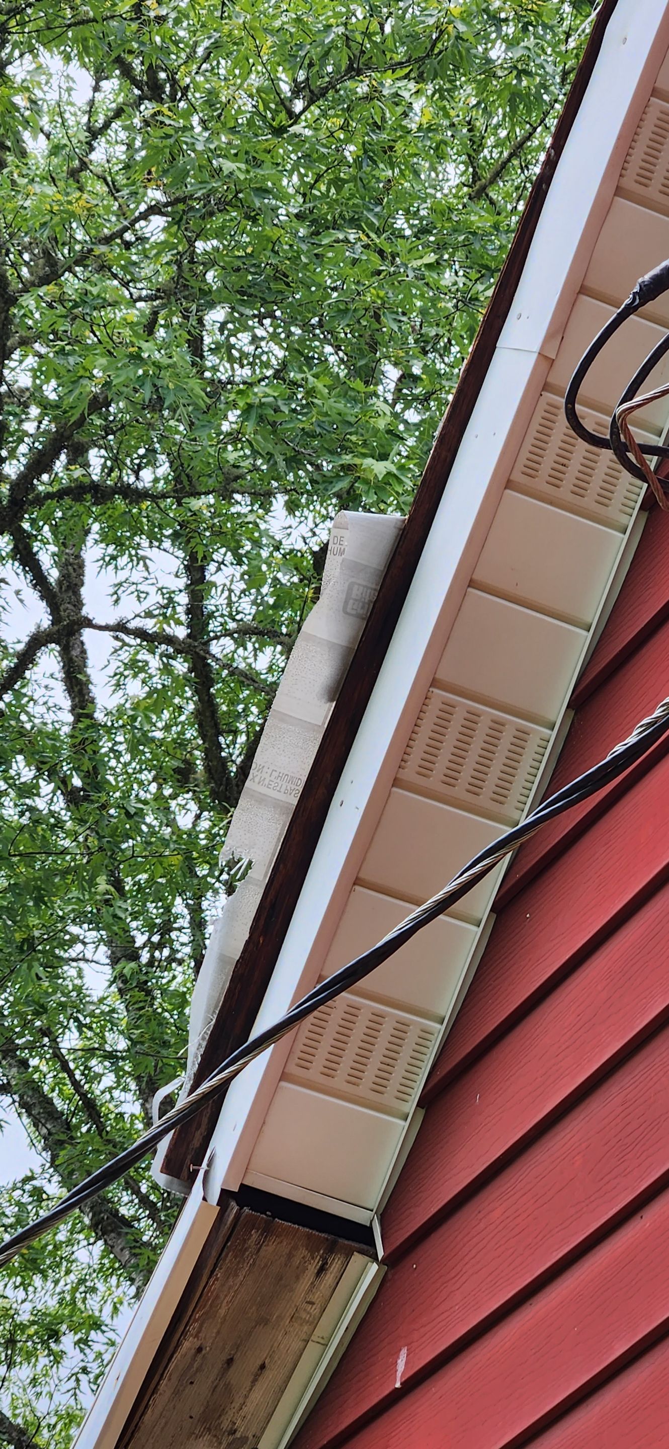 Residential Roofing Installation using 26 Gauge Colored Panels by Hostetler Roofing