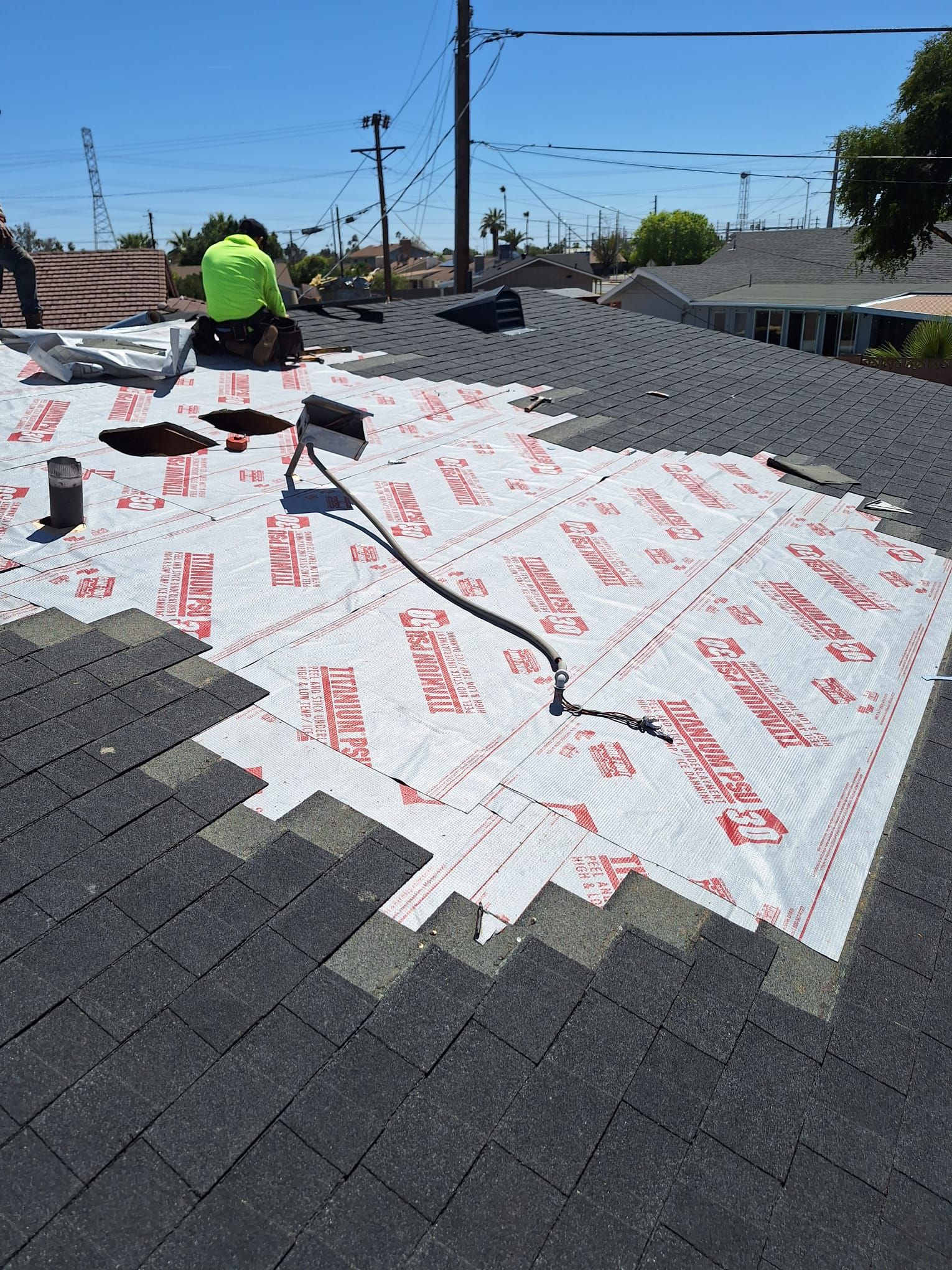 Onyx Black Shingles by Reimagine Roofing