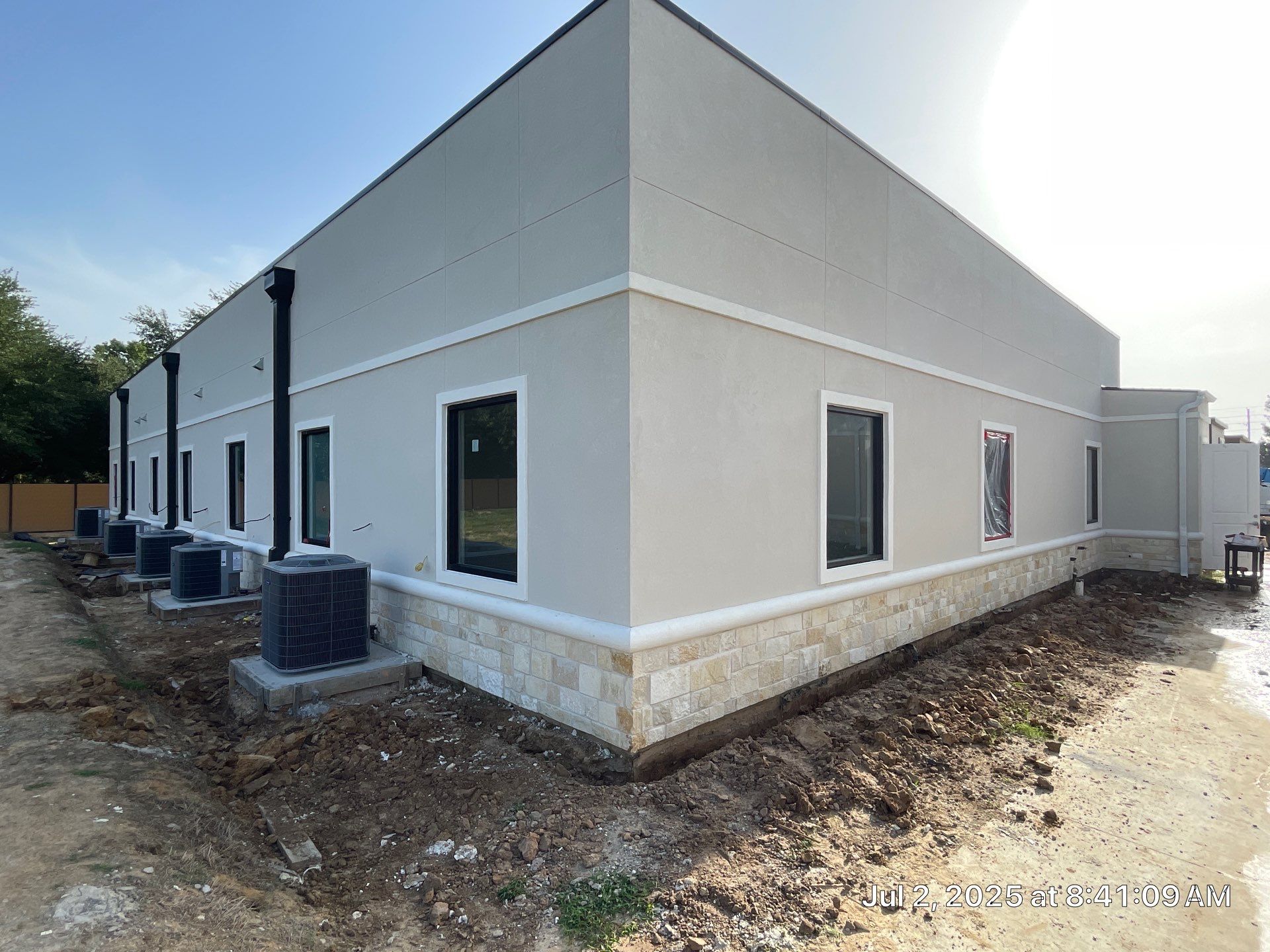 Commercial Façade Excellence with Bullnose Detailing by Apex Conventional Stucco Llc