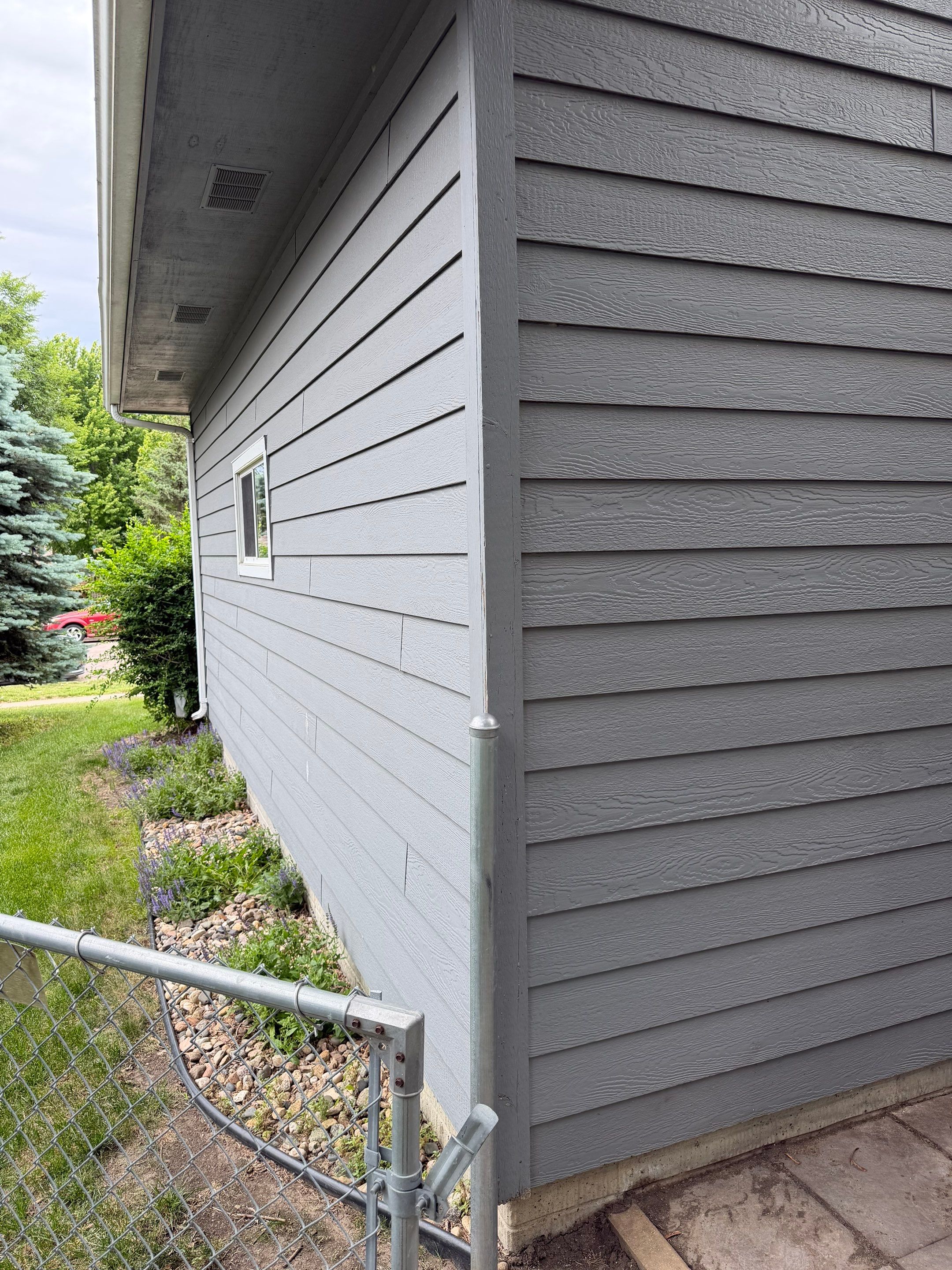 Full Exterior Painting for Gray Siding and Trim in Sioux Falls by Select Painting, Coatings & Garage Cabinets