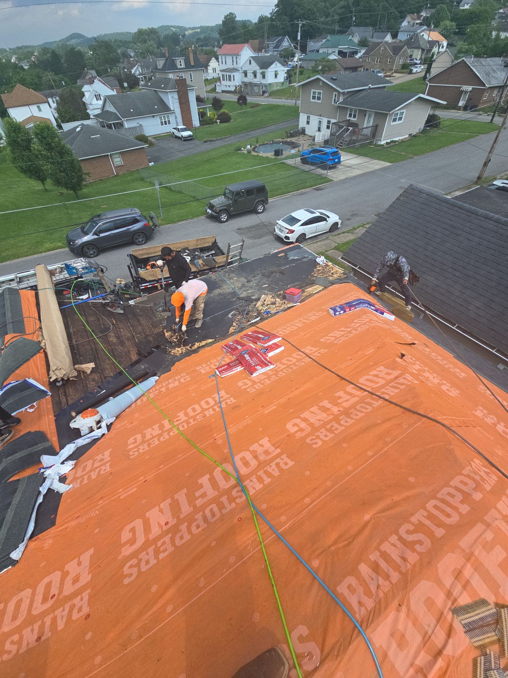 Residential Roofing Installation using GAF Timberline HDZ Charcoal by Rainstoppers Roofing