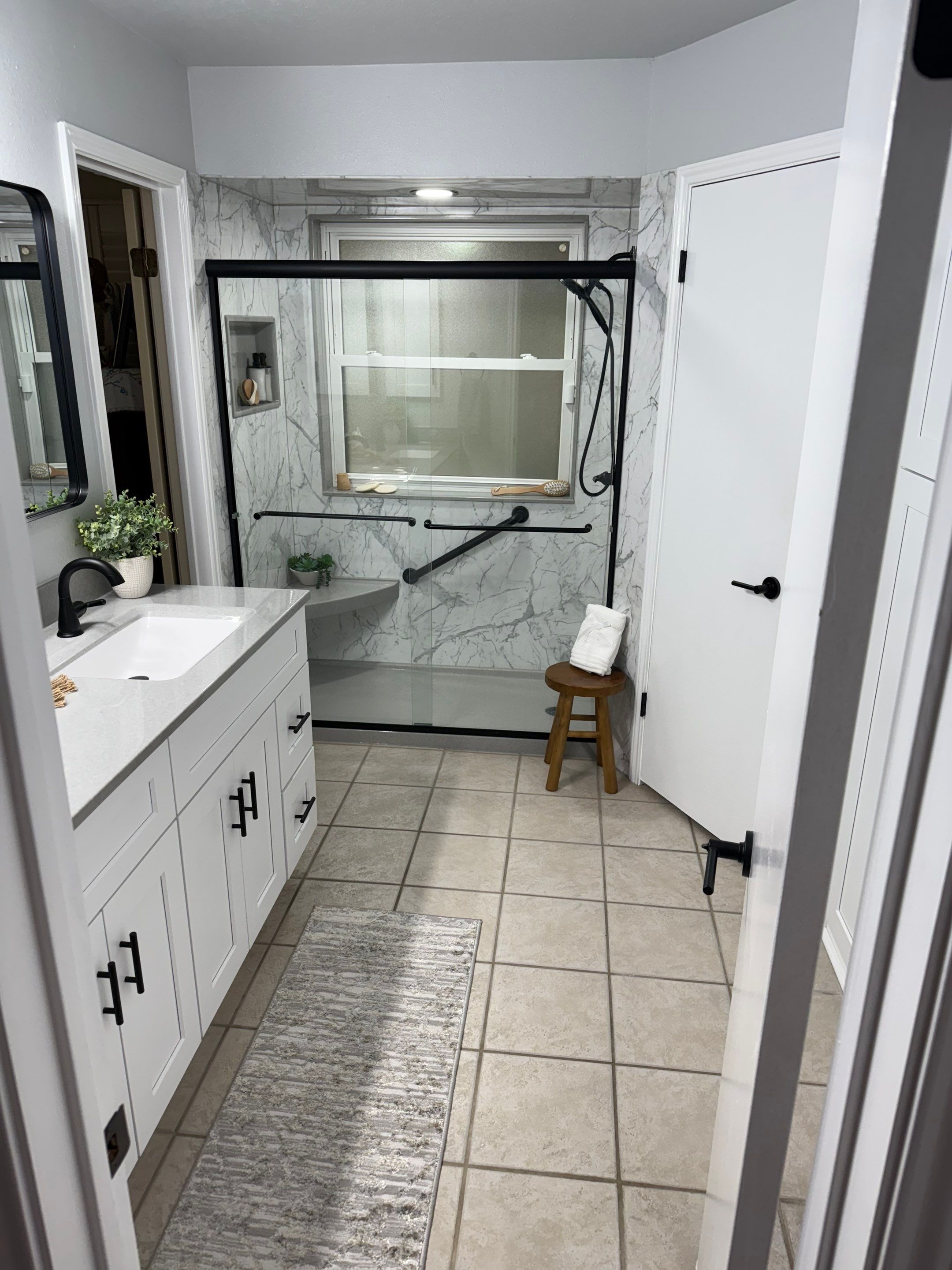 San Antonio Tub-to-Shower Conversion with Safety Features and Updated Vanity by Legacy Bath and Kitchen 