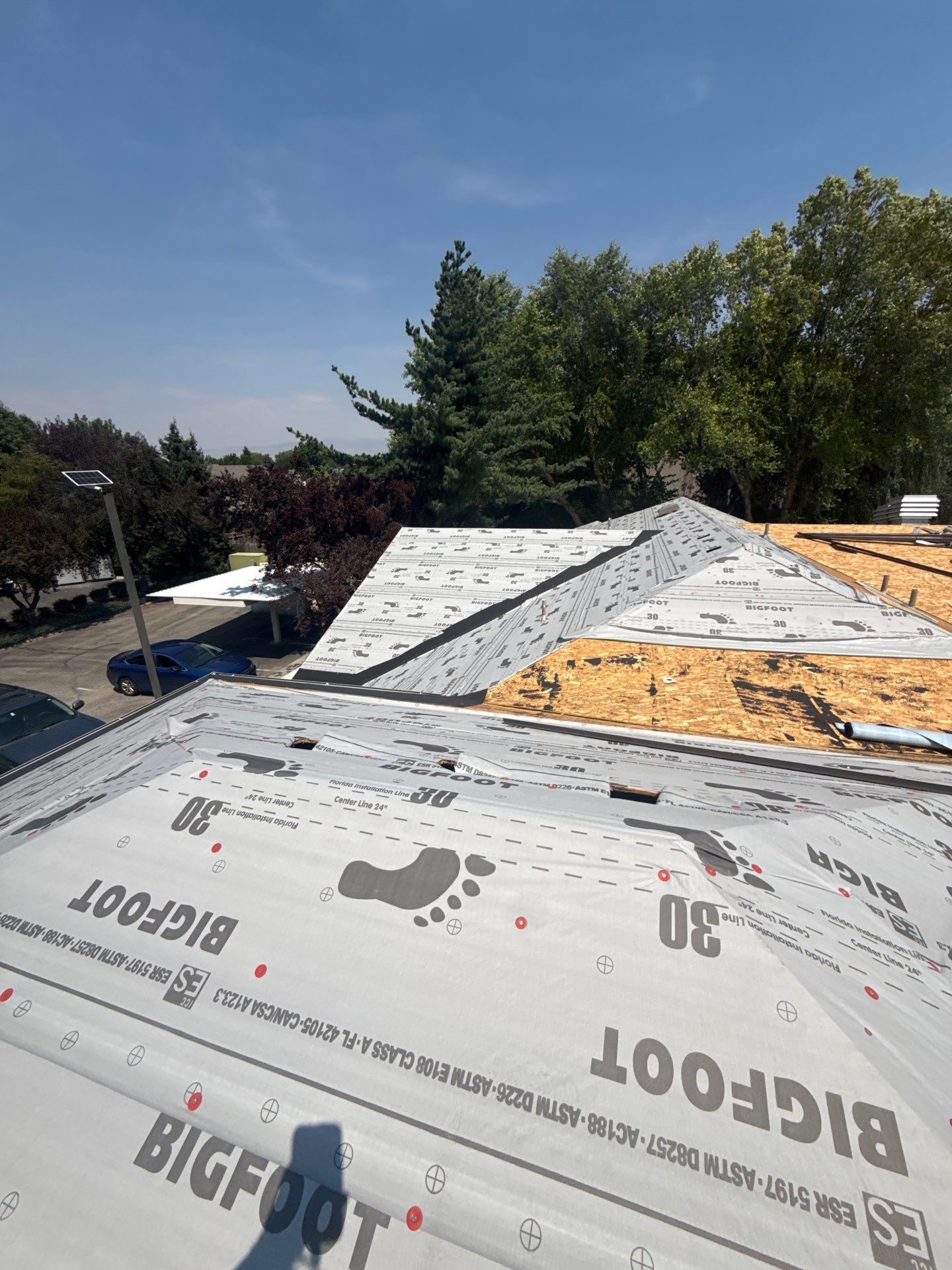Boise Commercial Roof Replacement with Brown Architectural Shingles by Olive Roofing