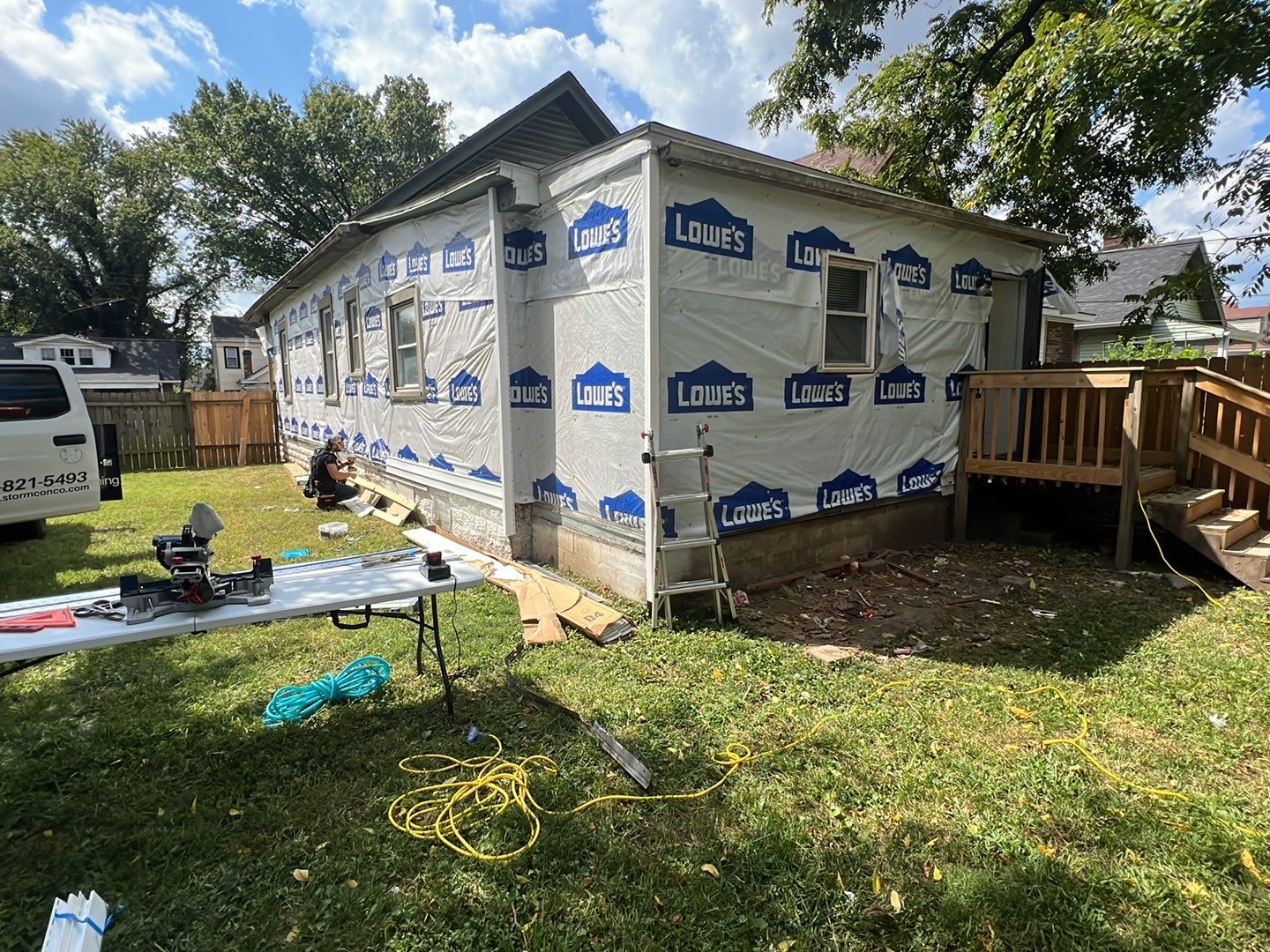 Rental Property Restoration, siding, flooring, gutters, landscaping by Storm Contracting 