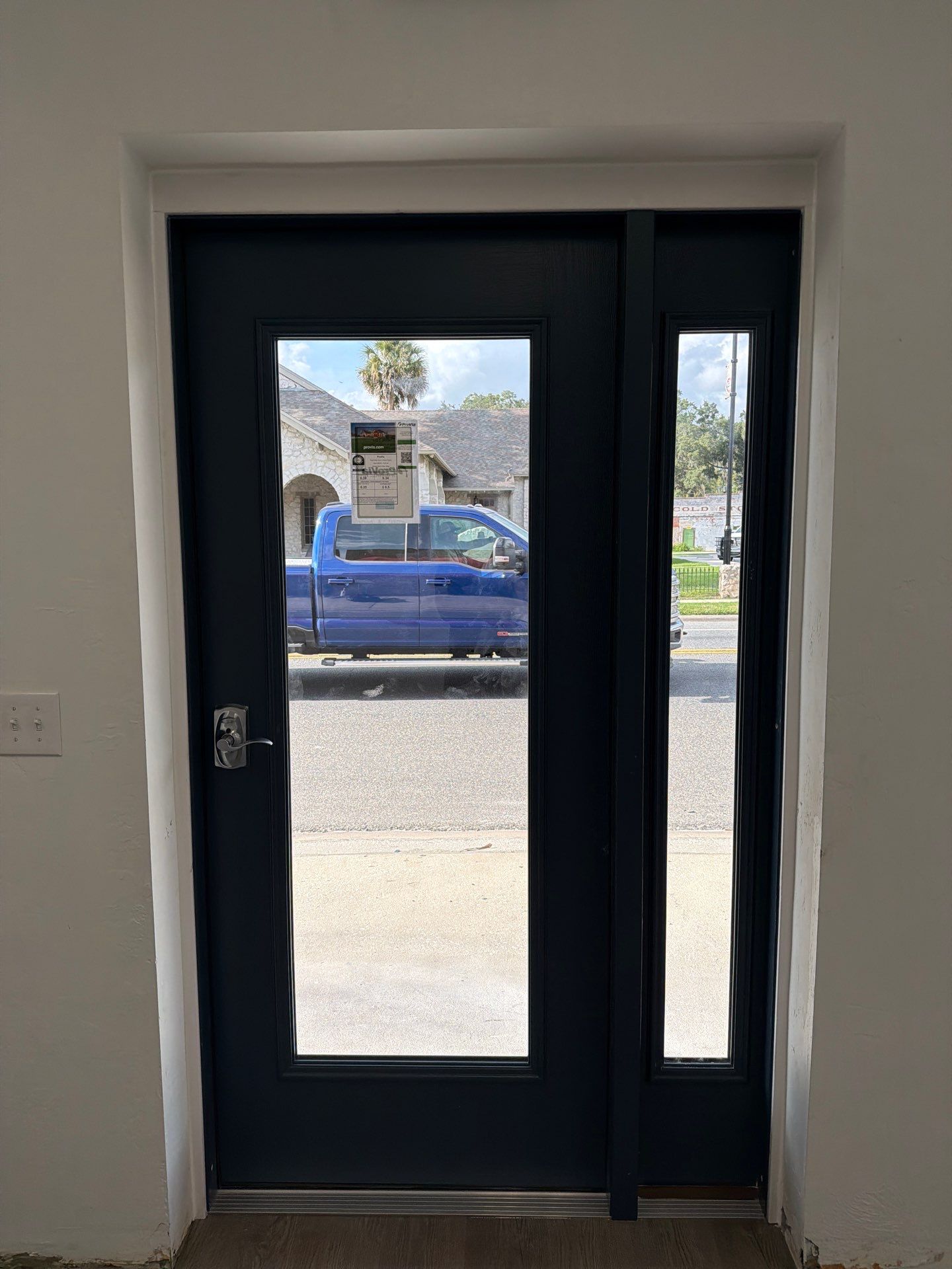 Commercial Entry Door Upgrade with ProVia Sidelight in Newberry by Windows & Doors Store